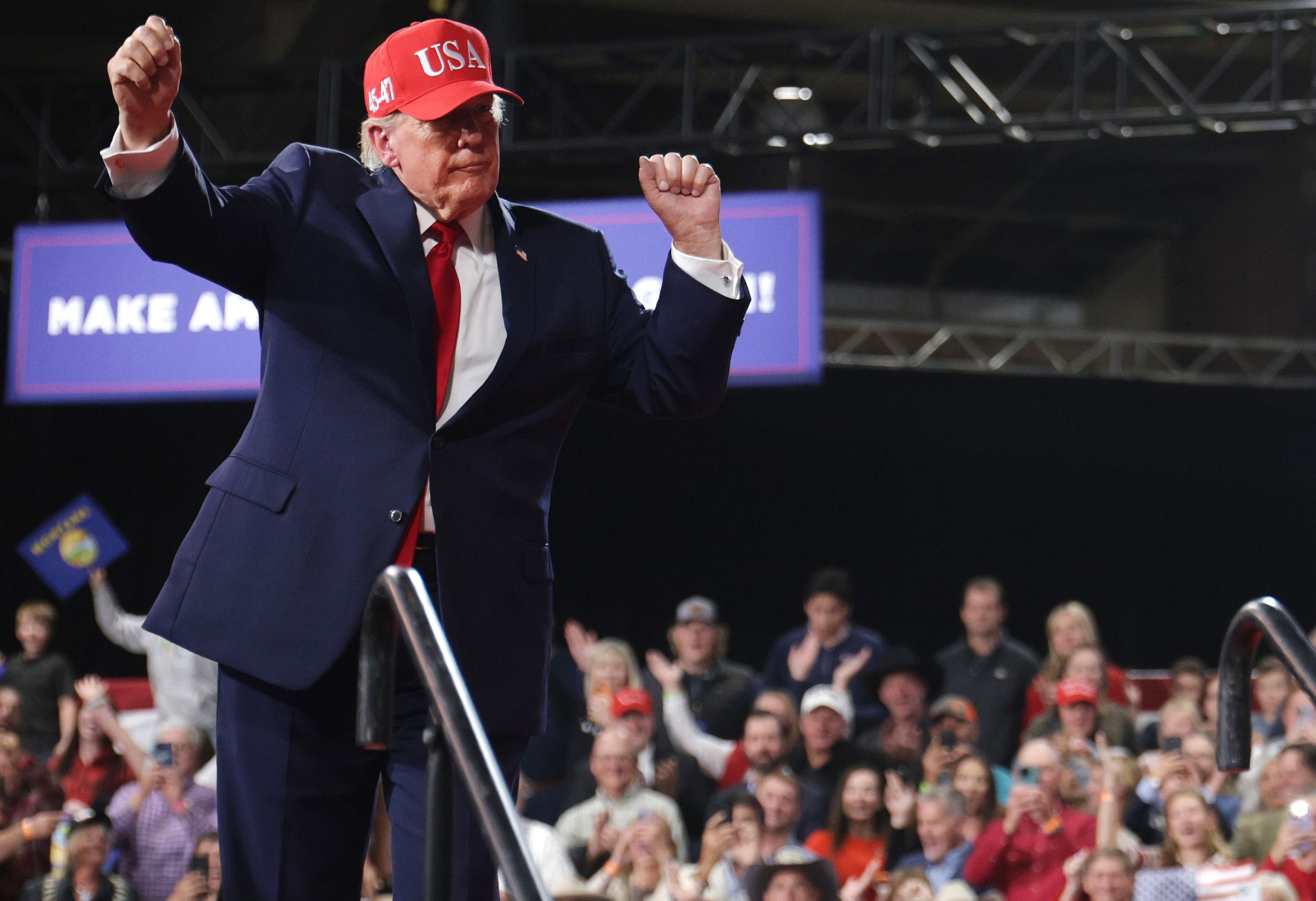 President Donald Trump dances as he walks offstage during an election rally at Majestic Valley Arena on October 14, 2026 in Kalispell, Montana. President Trump traveled to Arizona and Montana today to campaign for Republican candidates ahead of the midterm elections. (Photo by Alex Wong/Getty Image