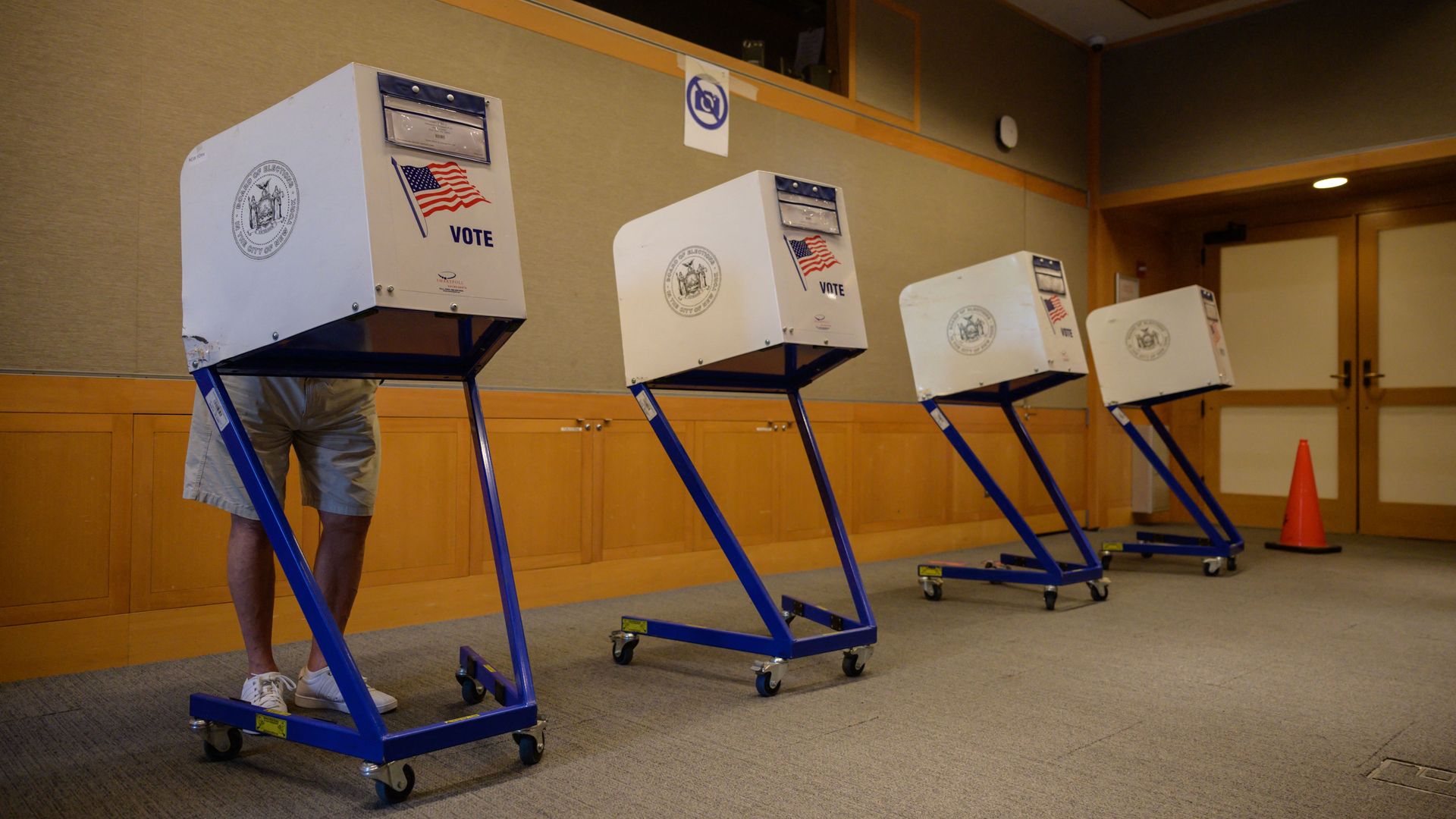 A photo of voting booths.
