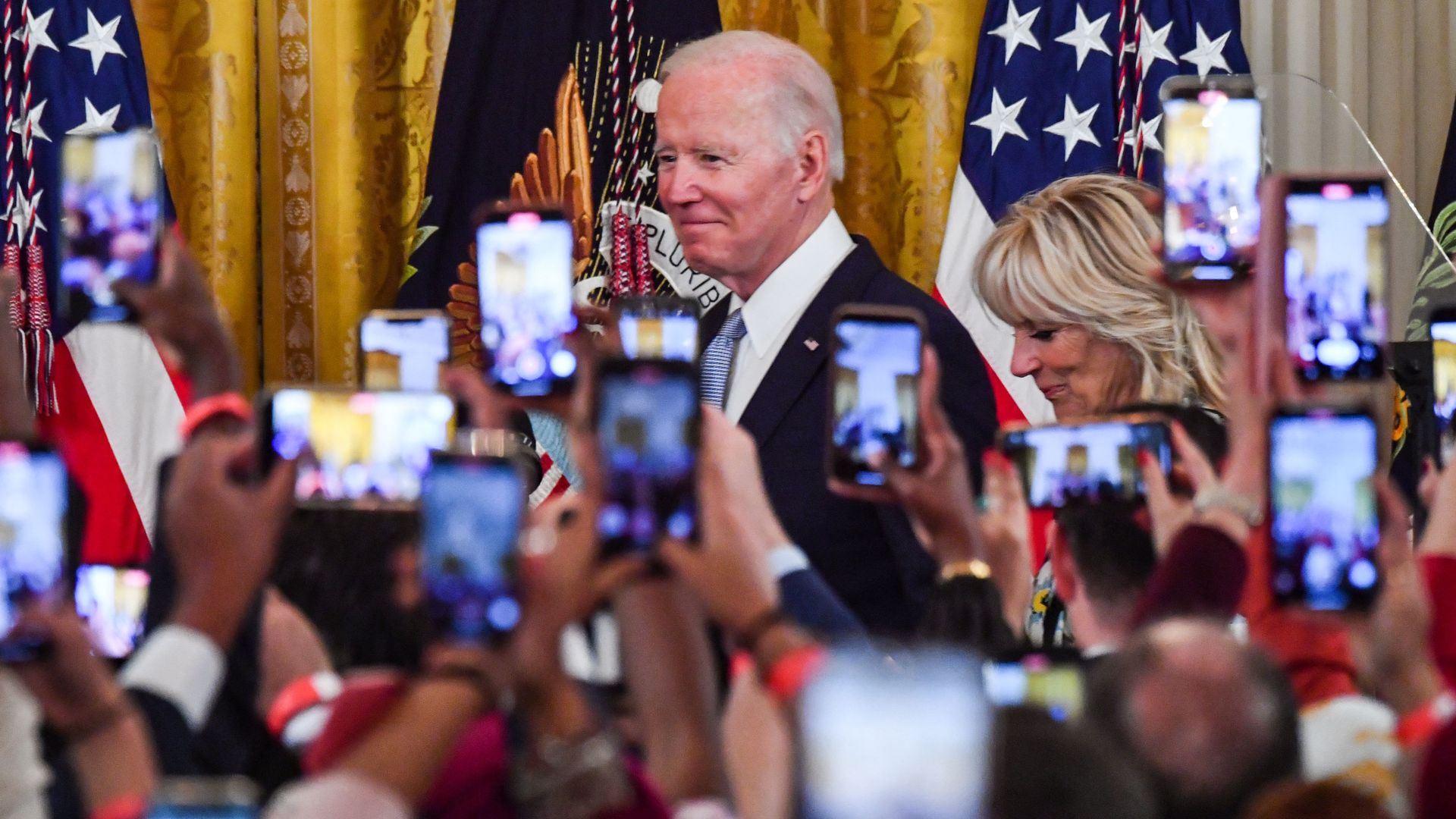 President Biden and first lady Jill Biden are seen entering an Eid celebration at the White House.