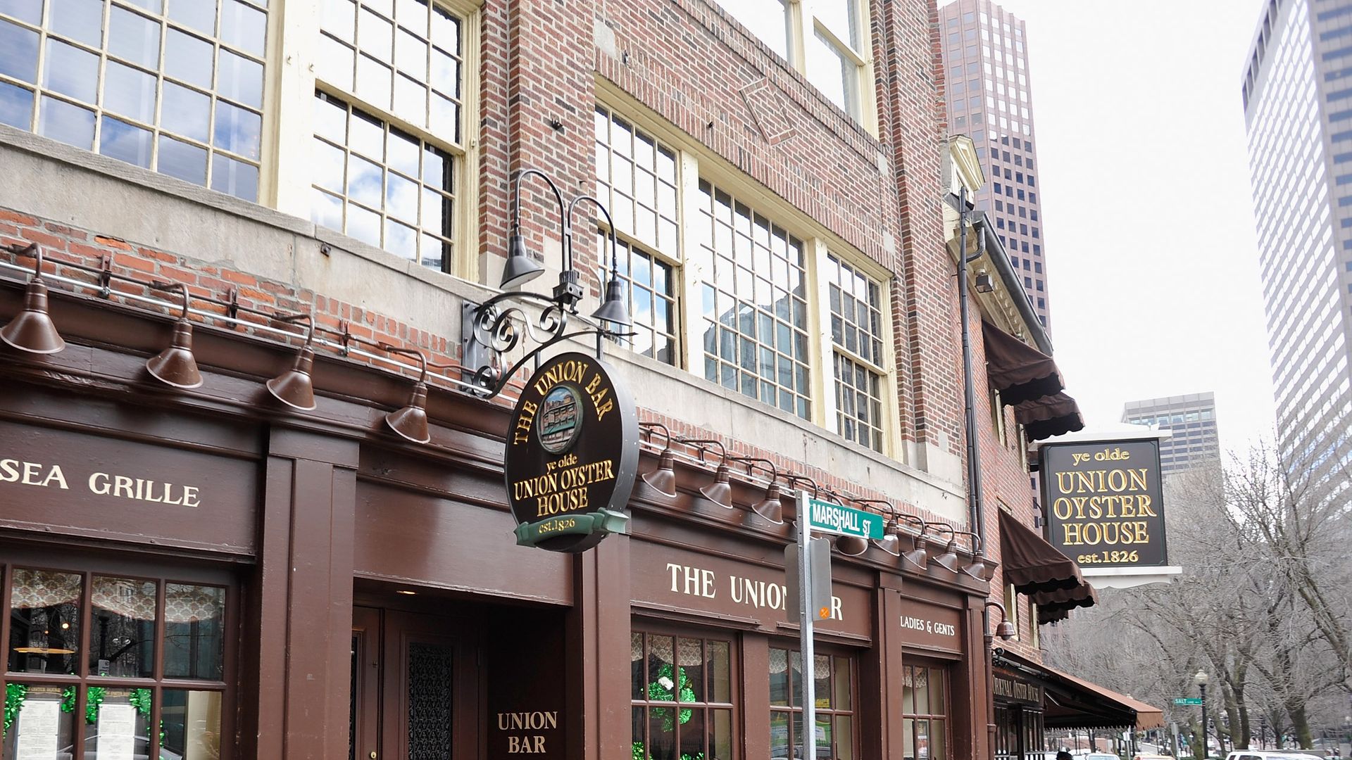 The exterior of the Union Oyster House, a historic brick restaurant in Boston.
