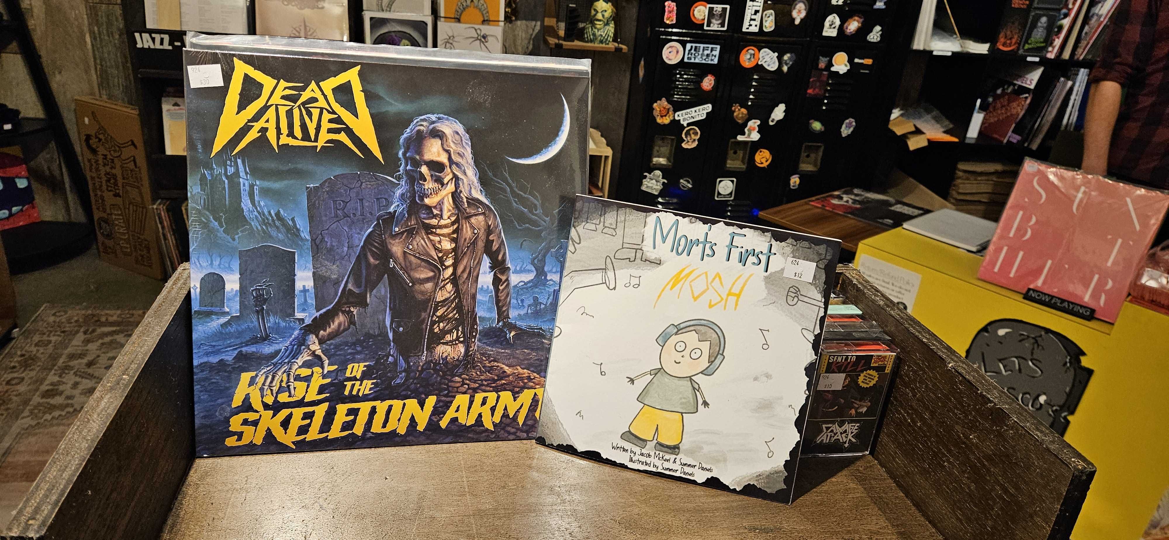 A rack featuring work by Nashville area artists at Dead End Records