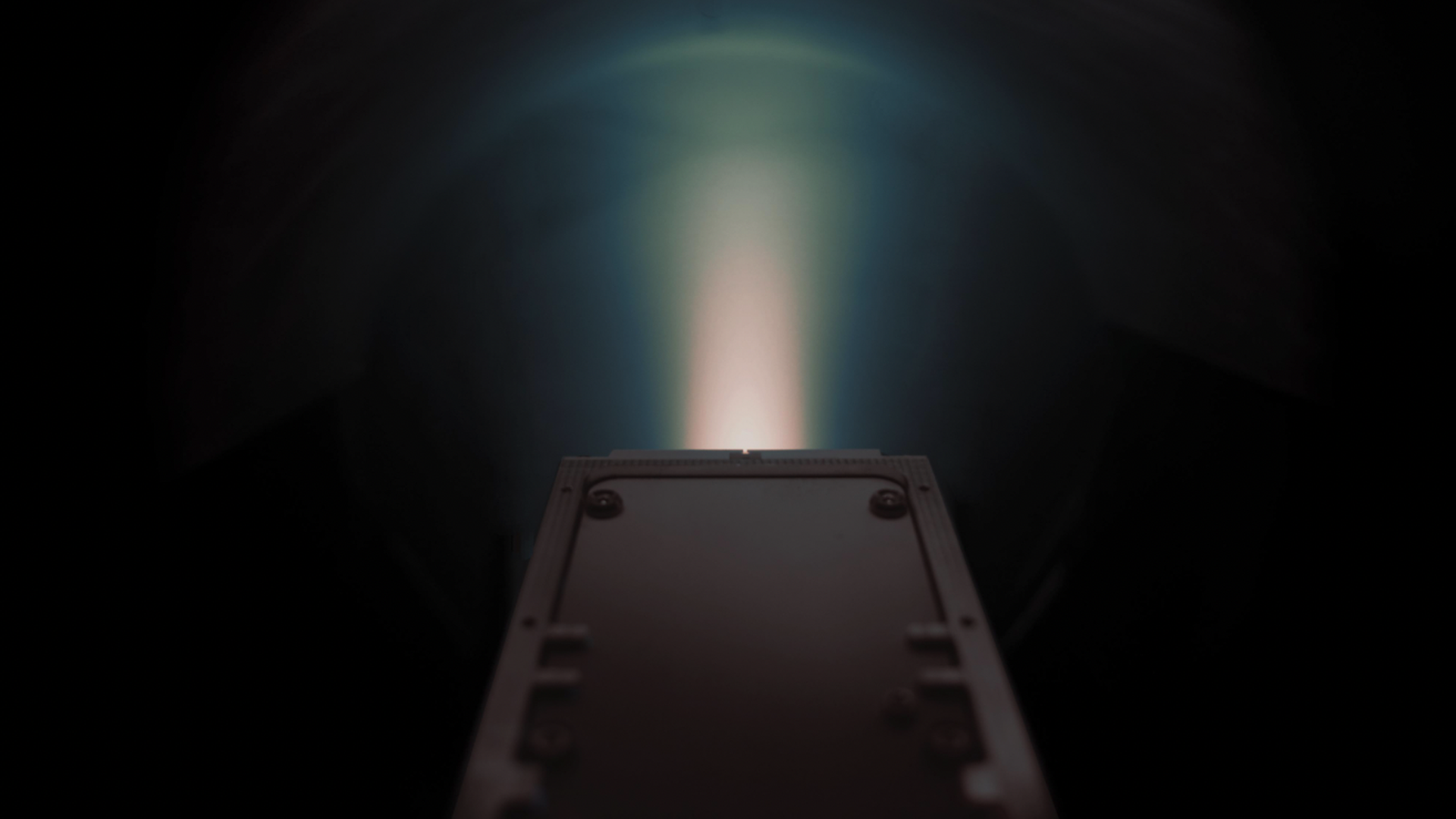 A view of the thruster as it fires in space