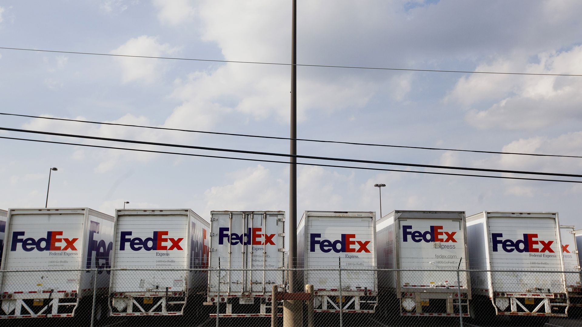 FedEx Corp. trucks sit lined up in a parking lot of the company's ship center near the Memphis International Airport in Memphis, Tennessee
