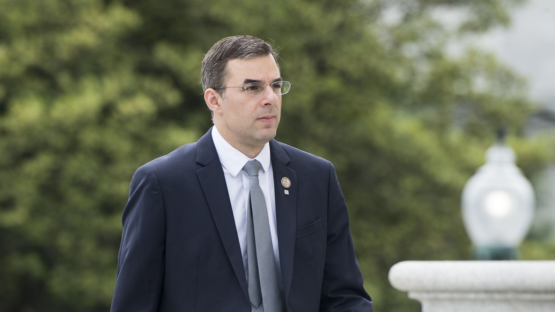 Rep. Justin Amash, R-Mich., walks up the House steps for a vote in the Capitol on Thursday, May 9, 2019.