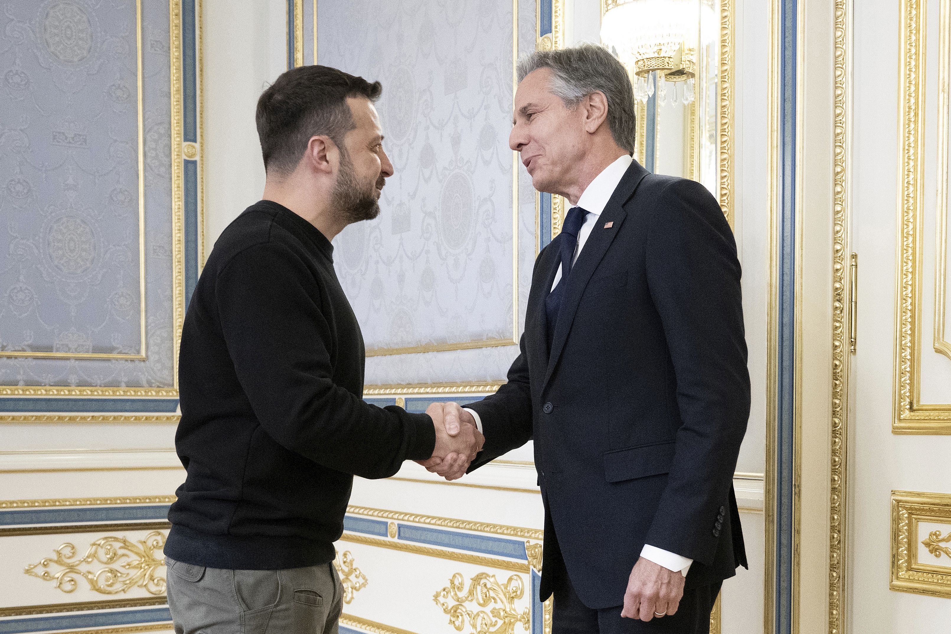 Ukraine's President Volodymyr Zelenskyy, left, greets U.S. Secretary of State Antony Blinken, right, prior to their meeting in Kyiv, Ukraine, Tuesday, May 14, 2024.