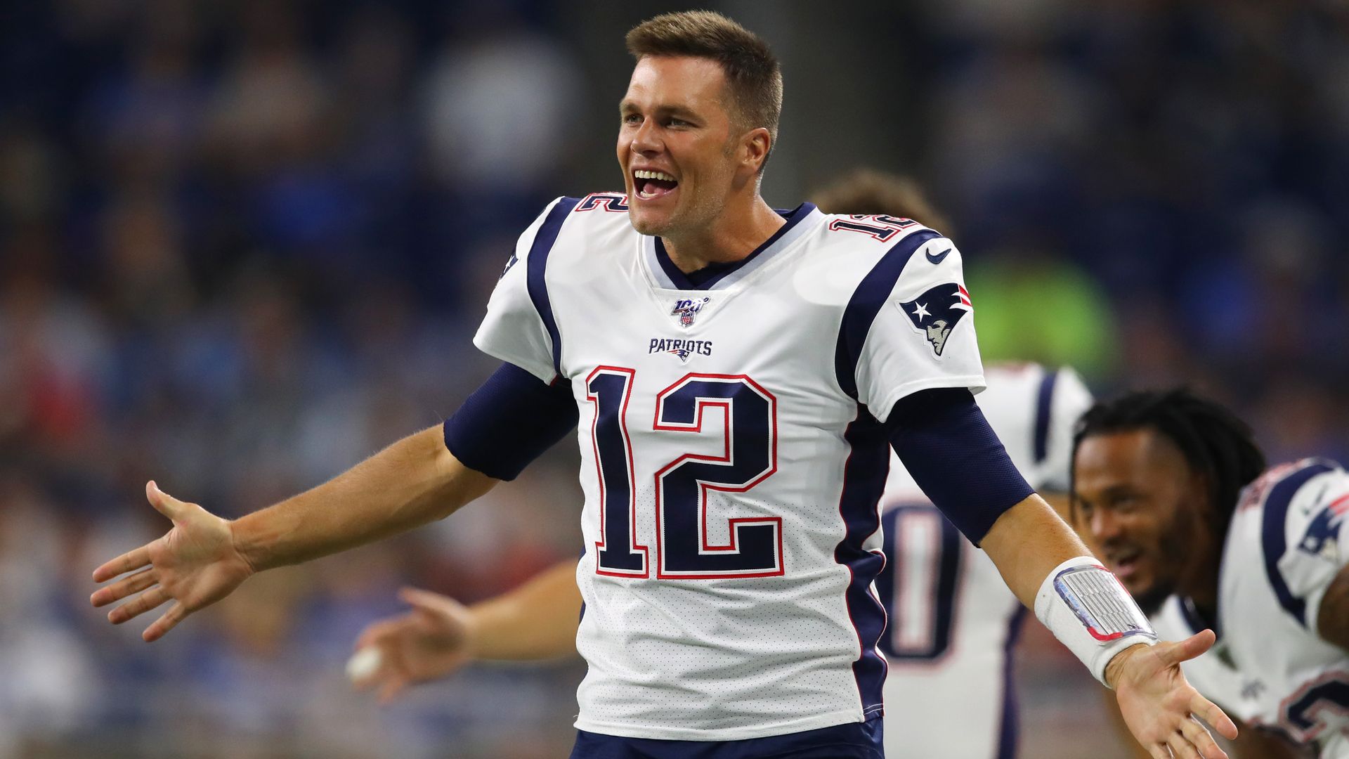 Tom Brady #12 of the New England Patriots reacts to his teams first quarter touchdown