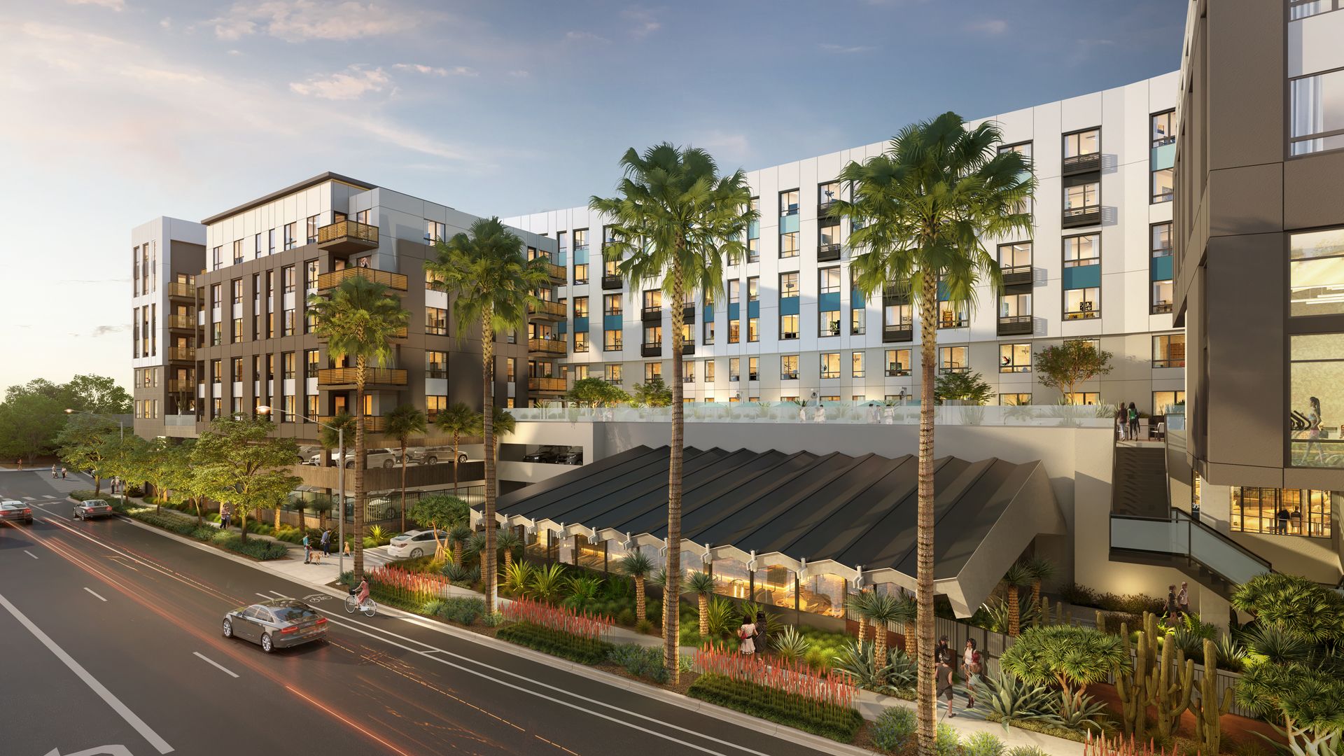 Rendering of a modern, multi-story residential building with white and gray panels, balconies, and blue accents, lined by palm trees. A busy street with cars and pedestrians at sunset.