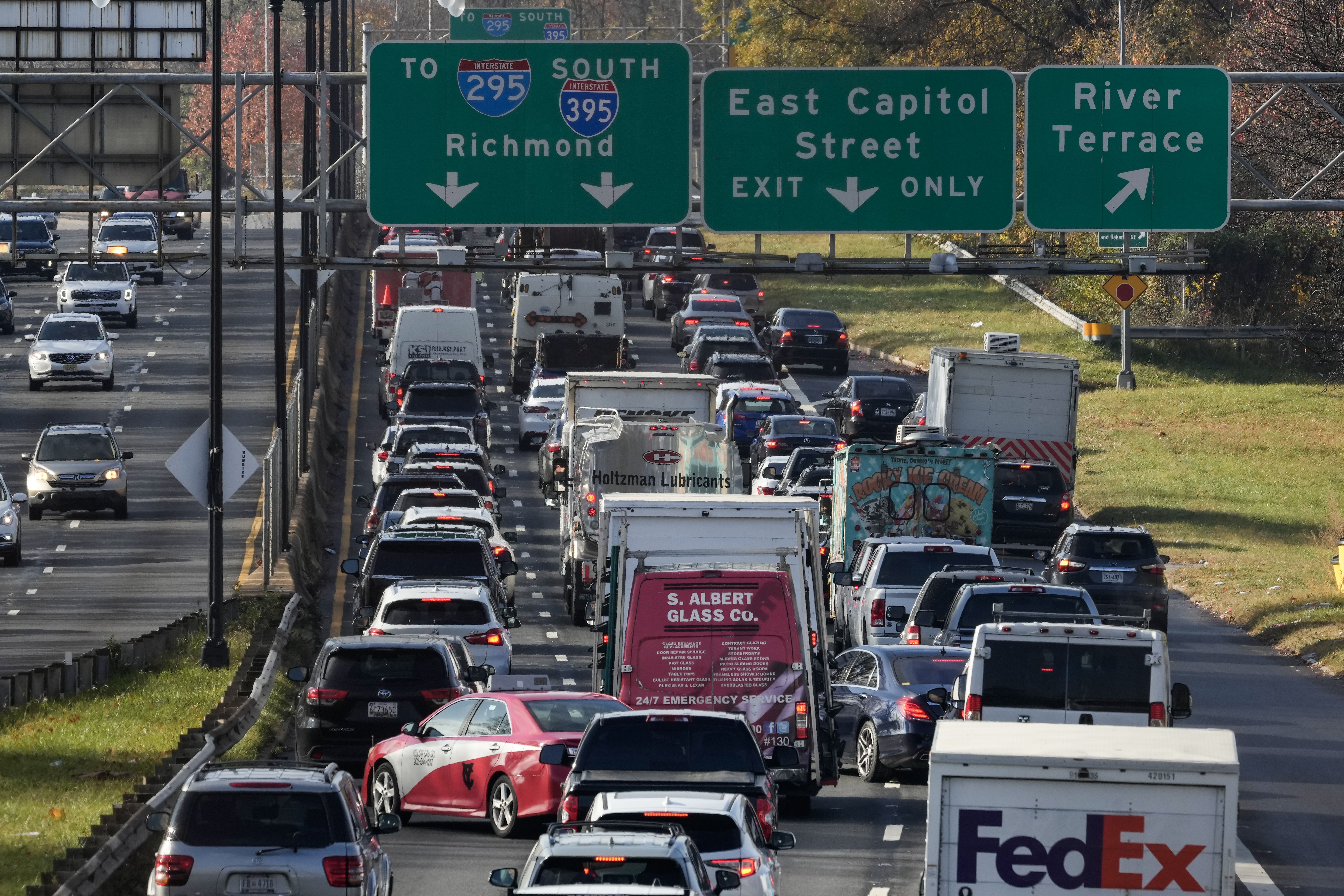 Heavy traffic moves along Interstate 295 on Wednesday morning November 22, 2023 in Washington, DC. 