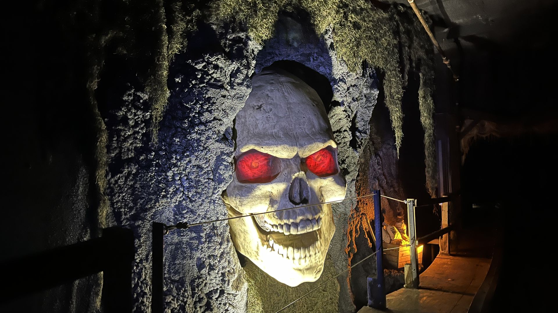A giant skull lit up and with red eyes