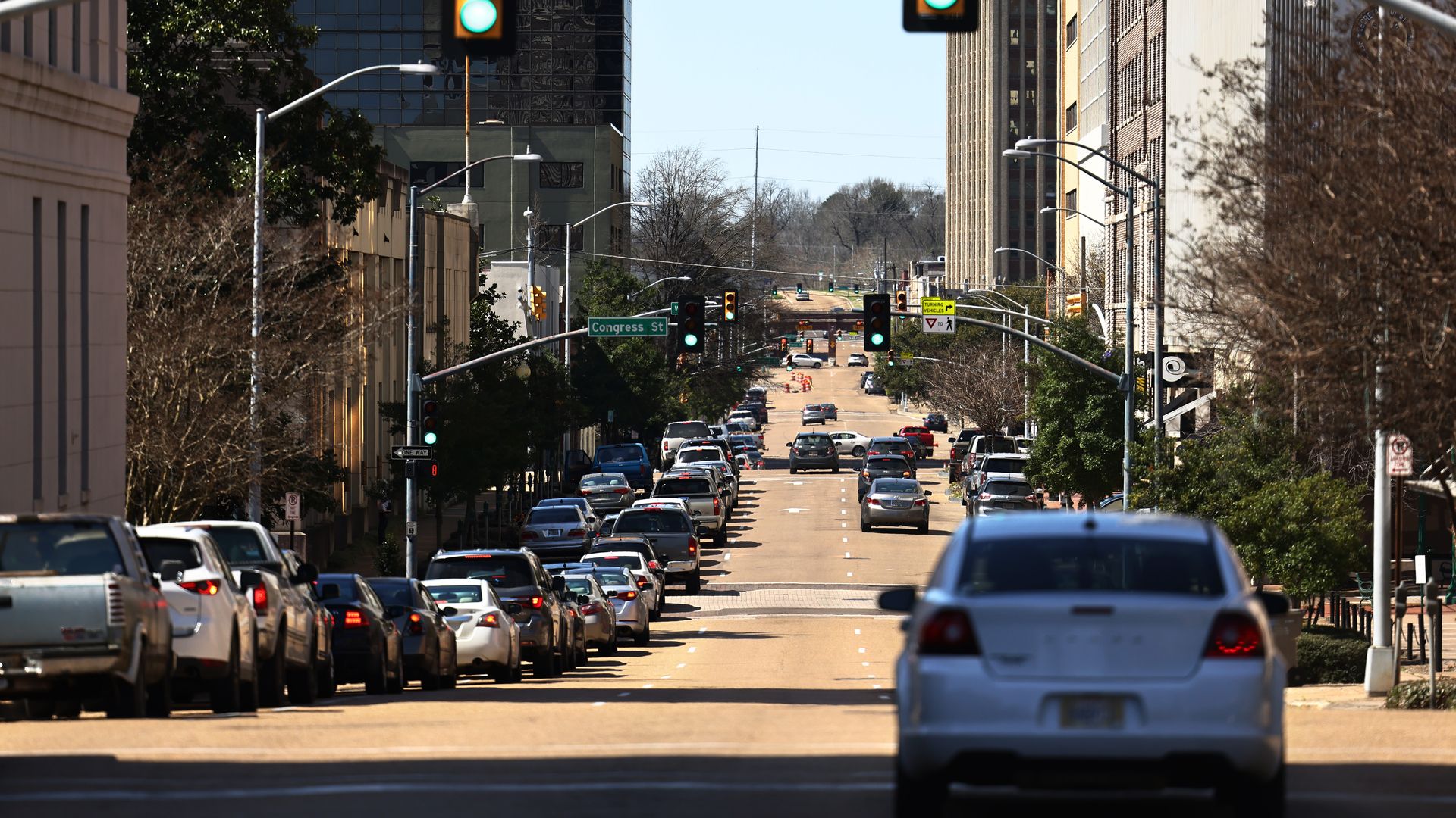 Photo of a line of cars on a street
