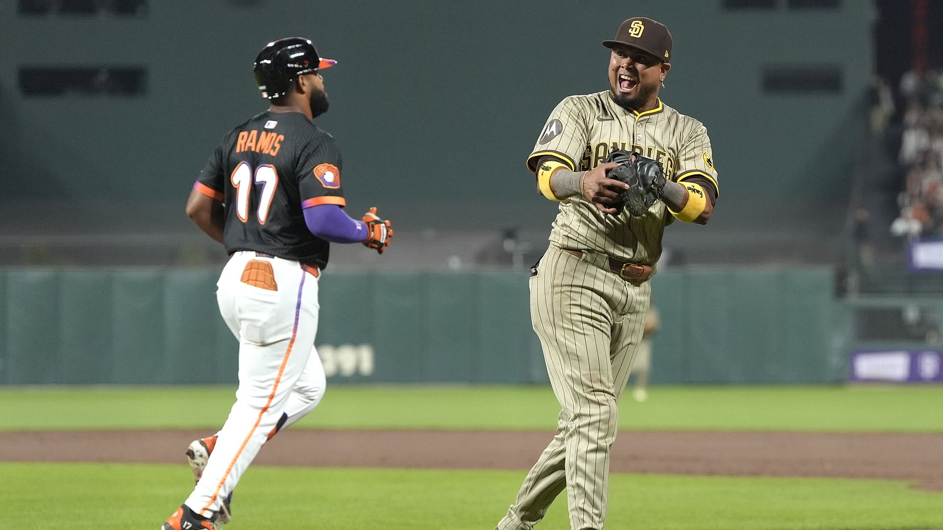 Luis Arraez laughs during a Padres win over the Giants