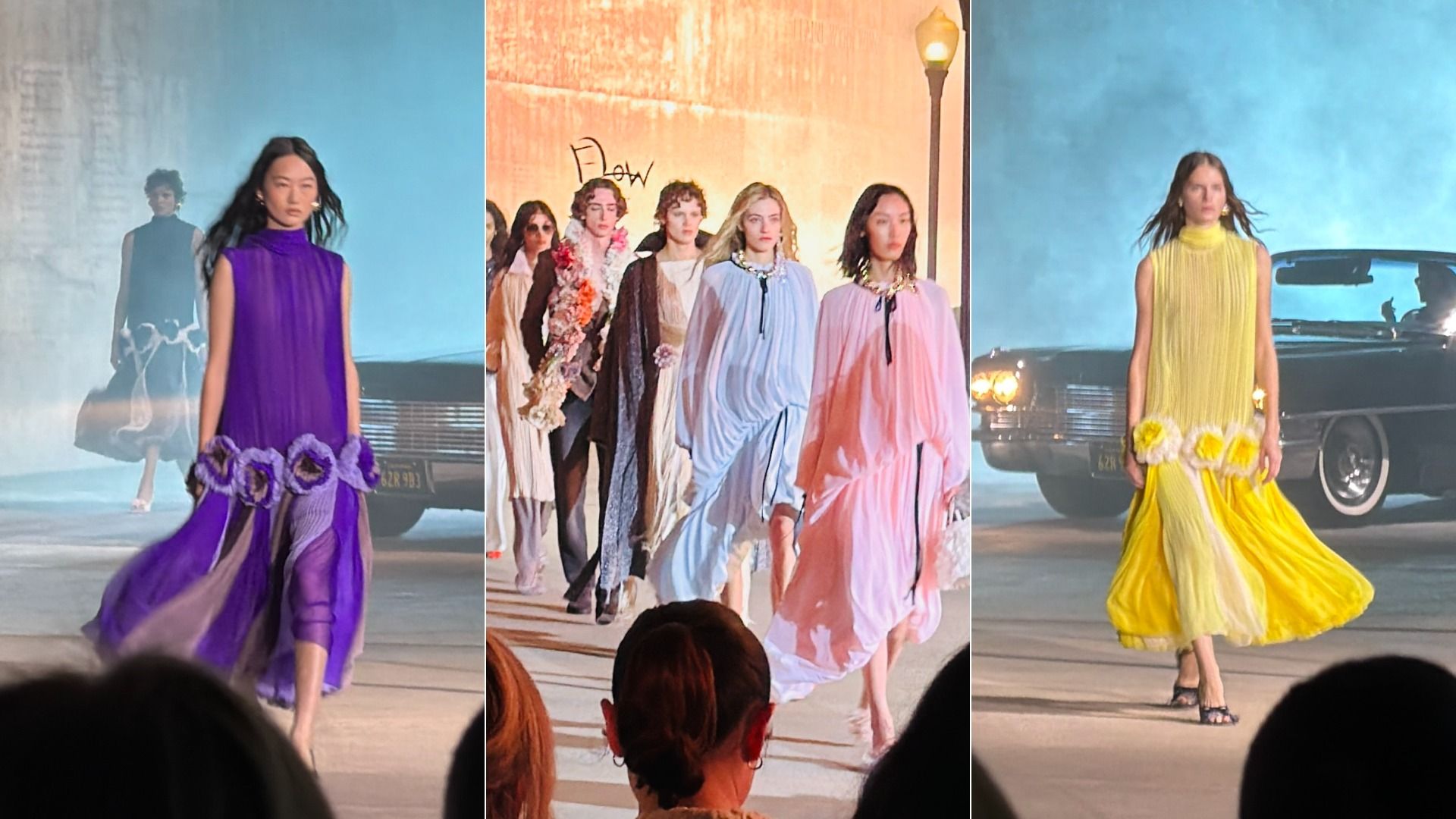 Triptych of models walking a fashion runway: left in a flowing purple sleeveless dress with a flower belt; center in pastel gowns; right in a bright yellow pleated dress with flower accents beside a vintage car.