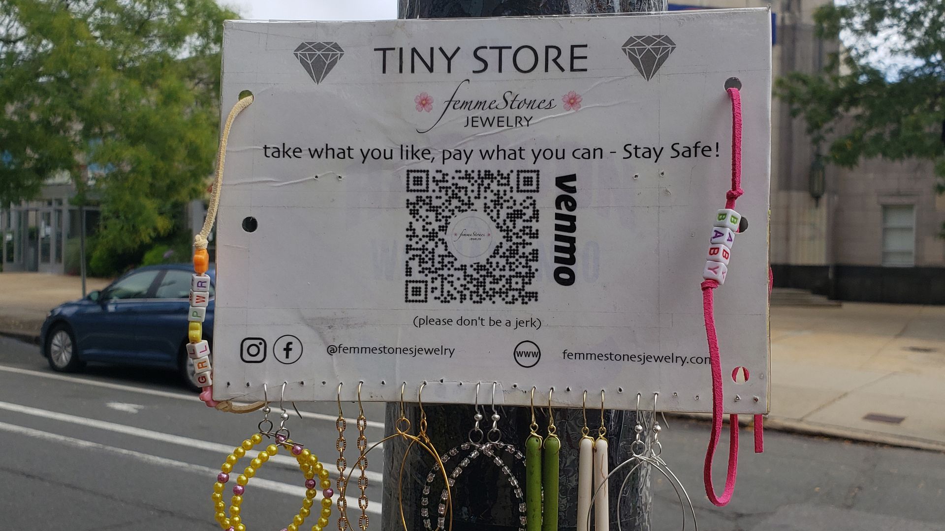 Some innovative commerce in Somerville, MA - a Venmo store pinned to a traffic light.