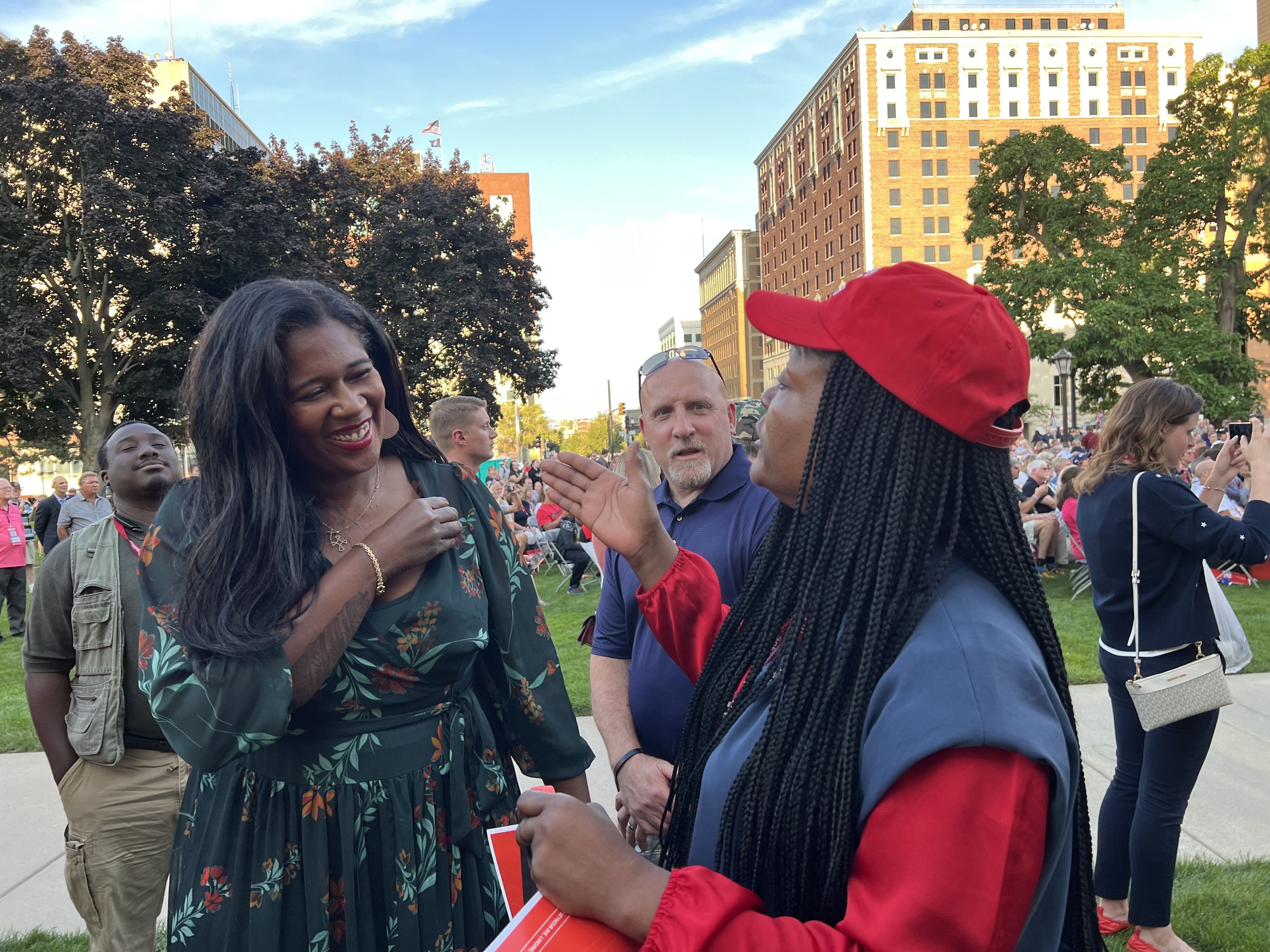 Karamo speaking with former Republican gubernatorial candidate and grassroots activist Atricia Bomer at the state party's "Red Wave" rally on the Michigan Capitol lawn.