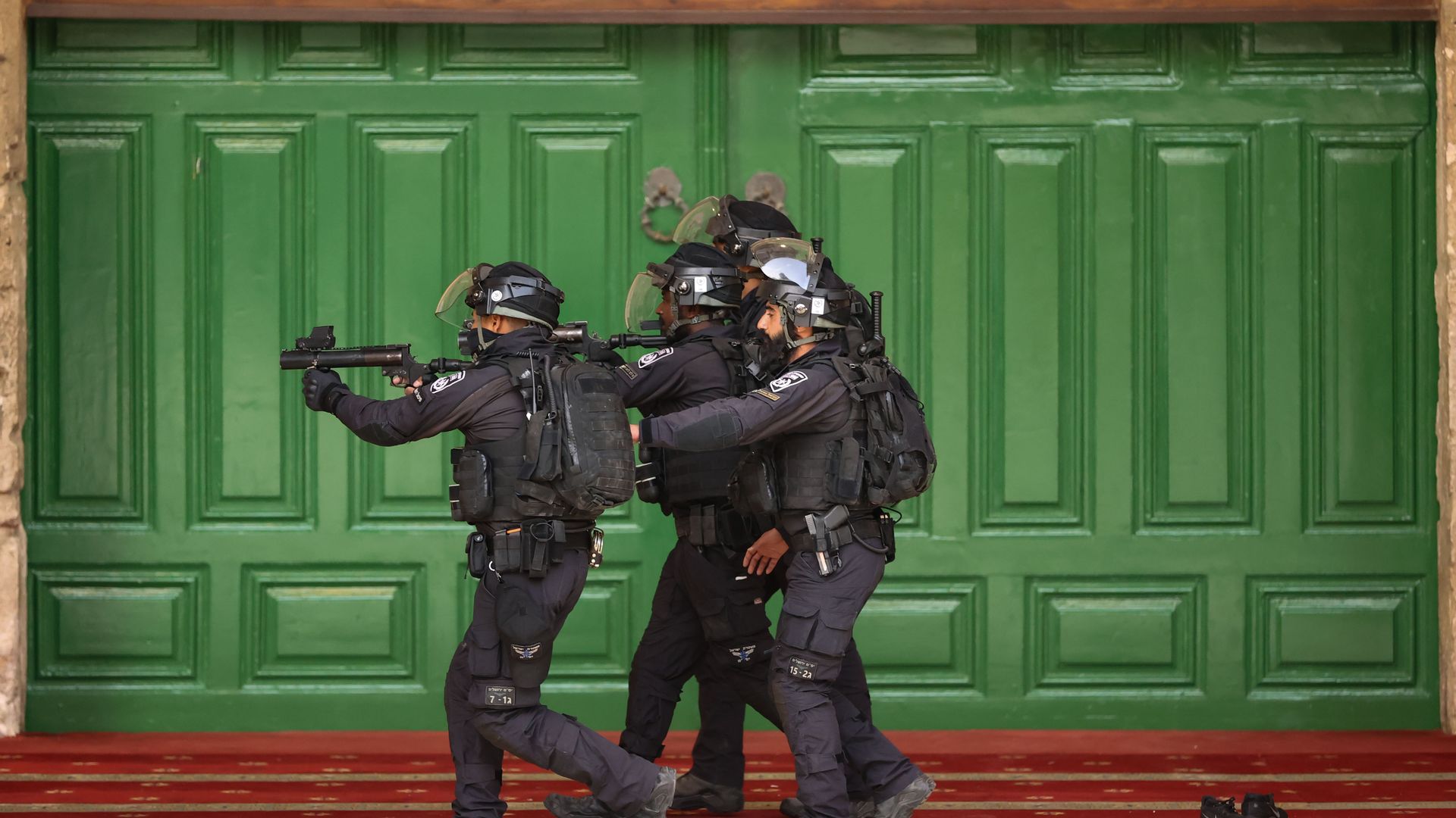 Israeli forces raid Al-Aqsa Mosque after a morning prayer to drive out Palestinian worshippers, in Jerusalem on April 18, 2022. 