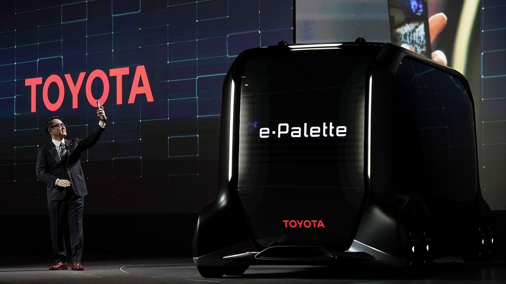 President of Toyota Motor Corporation and the e-Palette Concept Vehicle.