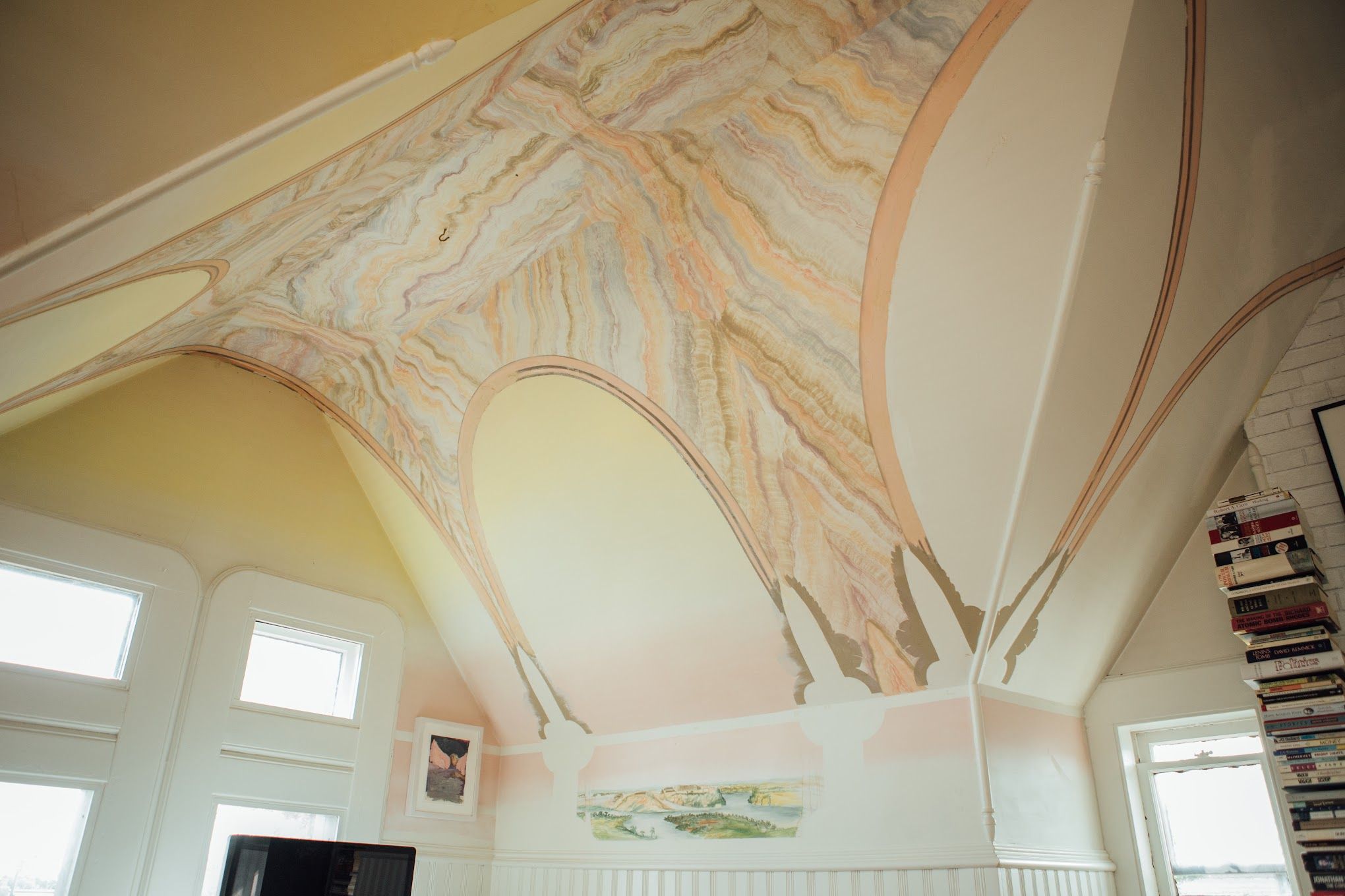 A photo of a mural on a ceiling that looks like marble.