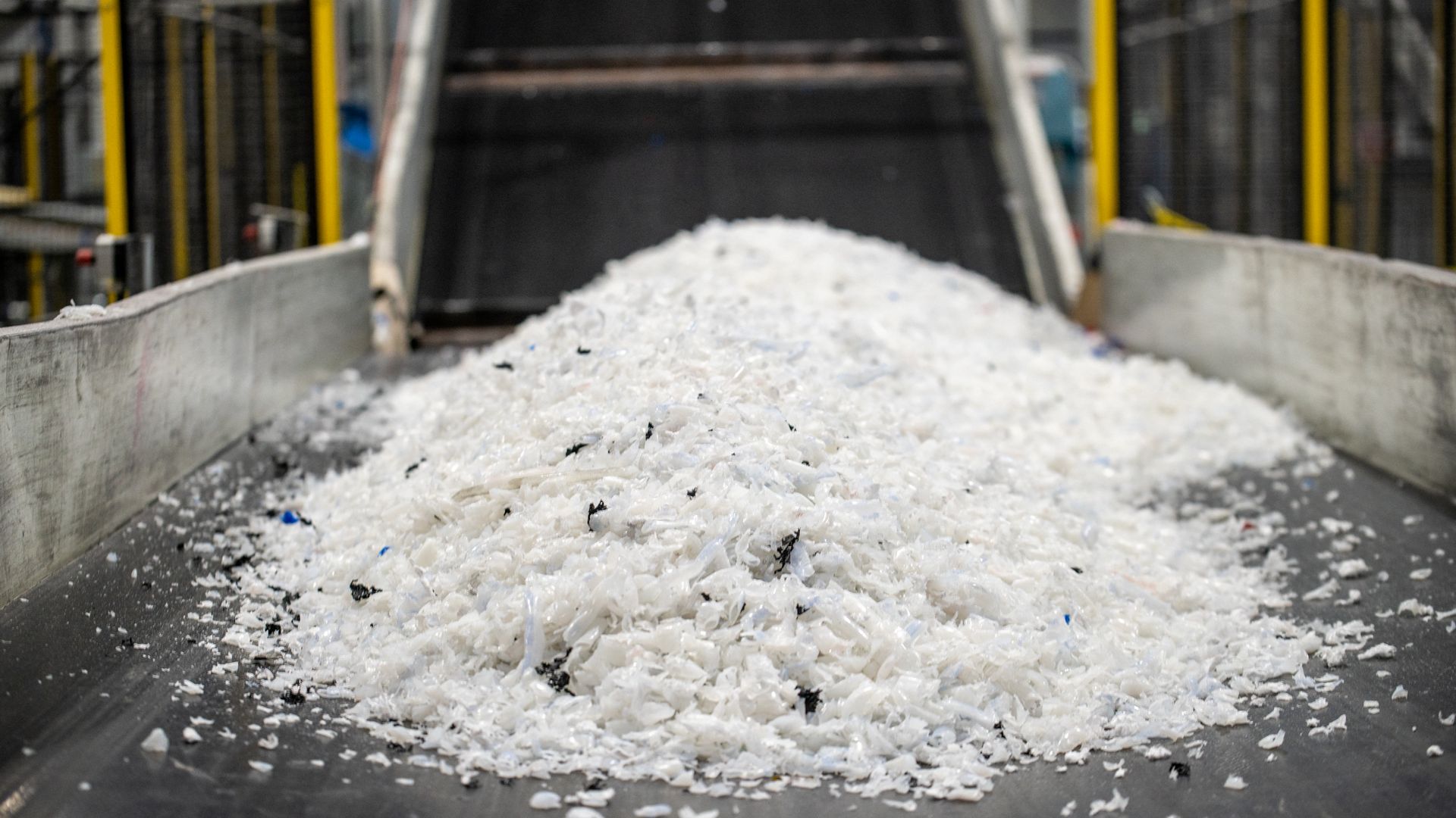 A conveyer belt at transports plastic at ExxonMobil's chemical recycling plant on October 11, 2023, in Baytown, Texas. ExxonMobil's facility is one of only 11 US chemical recycling plants constructed, according to an October report by Beyond Plastics, which said the small number is indicative of a p