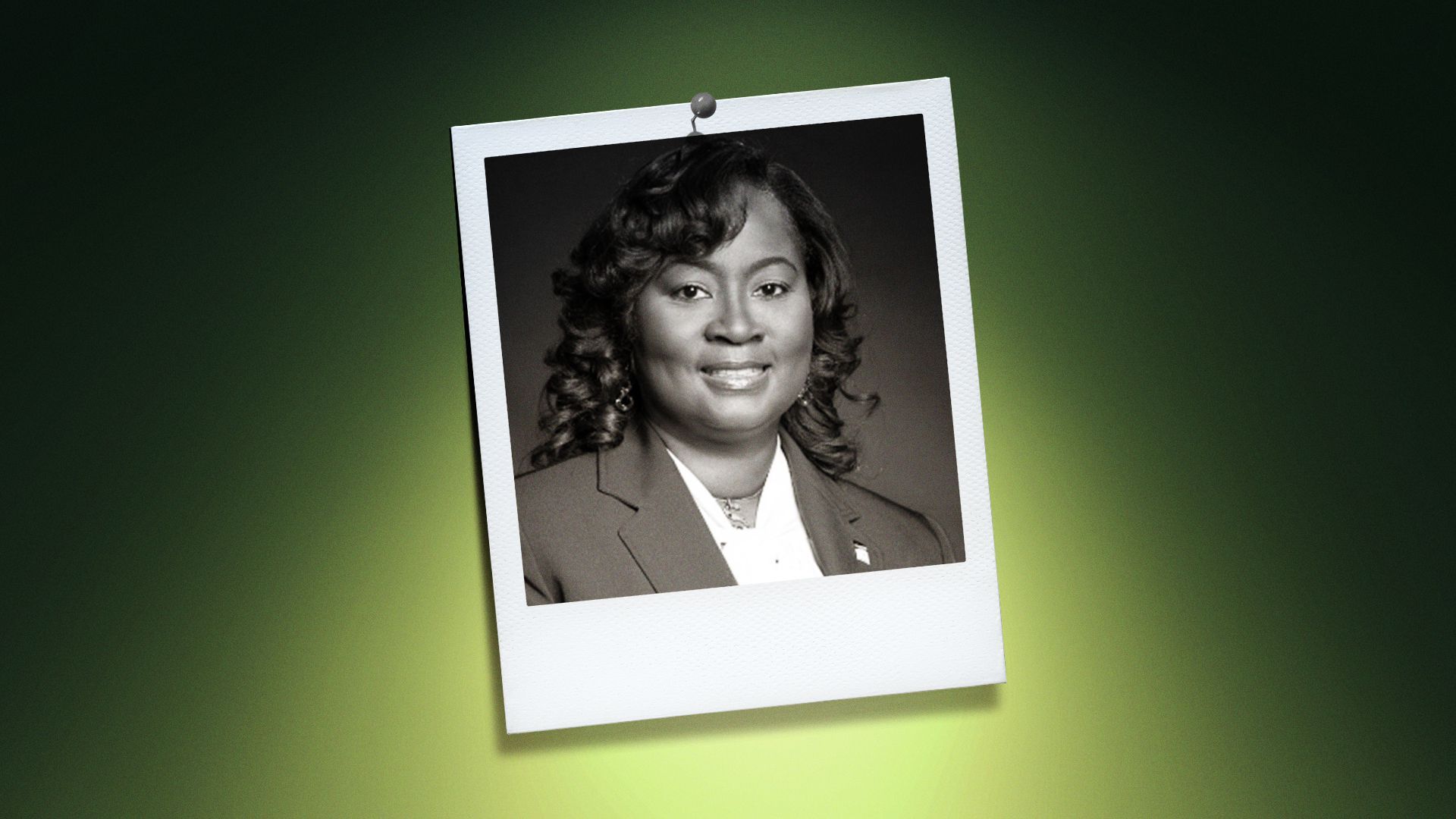 Photo illustration of Shinica Thomas, chair of the Wake County Commissioners, in the center of a Polaroid photo under a green spotlight.