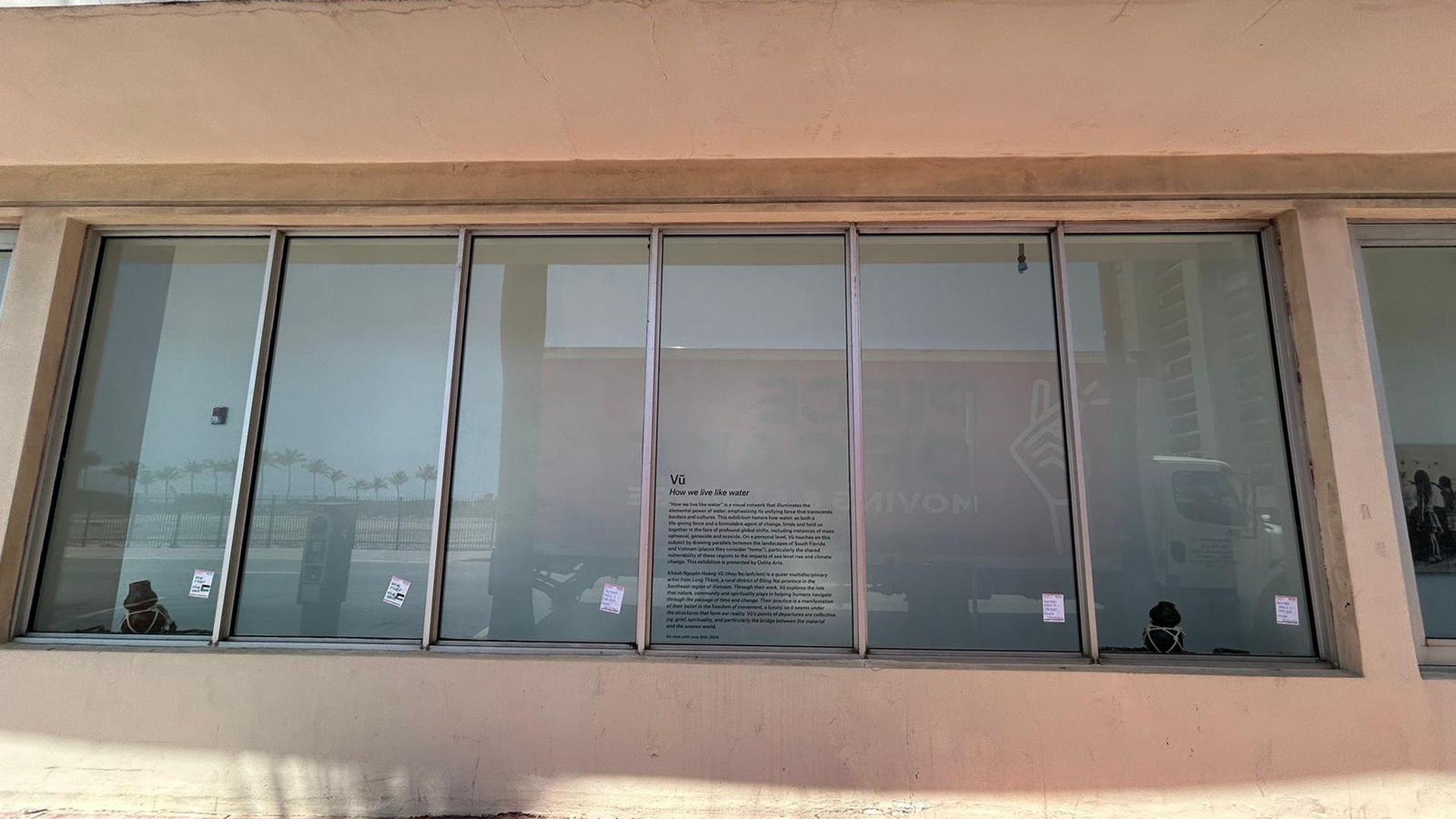 A blank storefront where an art exhibit was once displayed