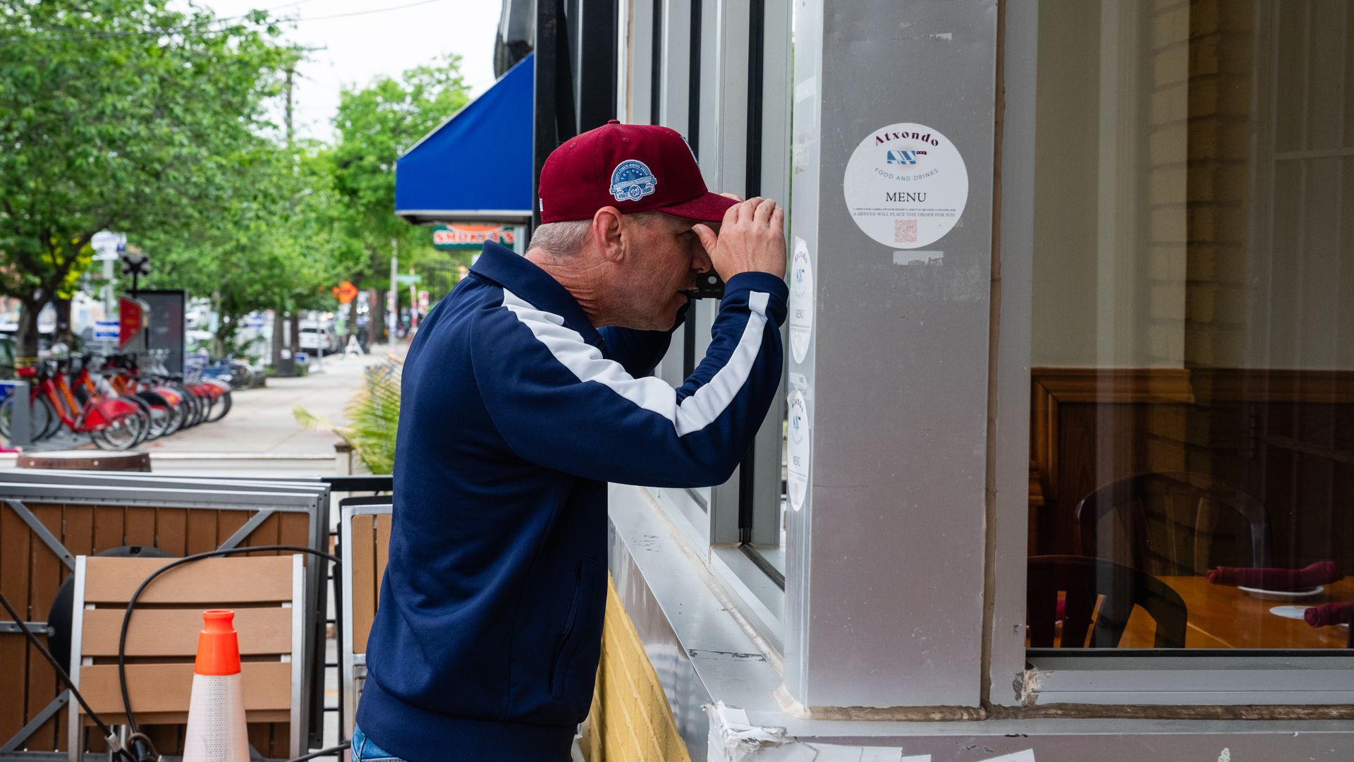 Dan Silverman looks into a storefront