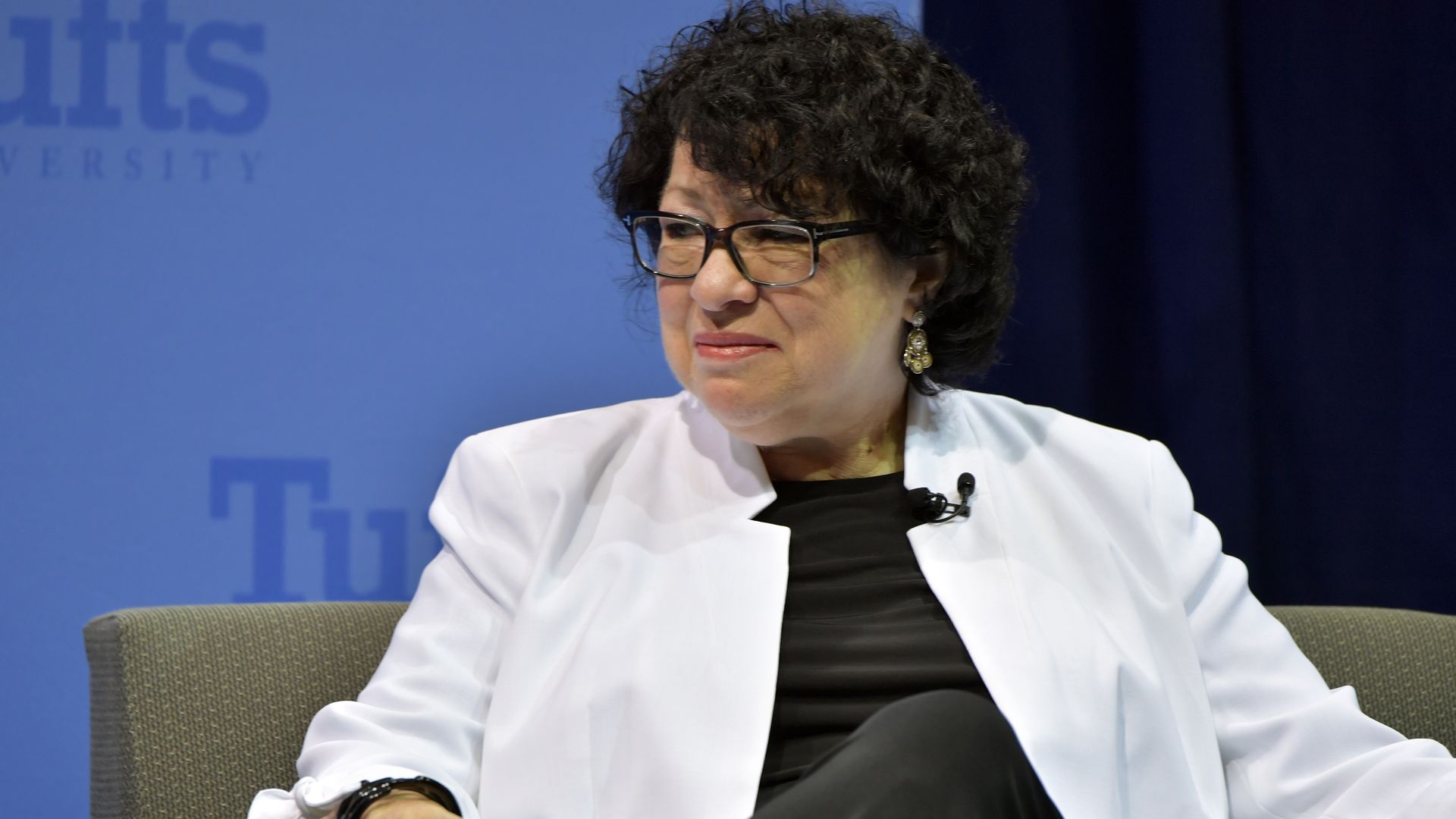 Photo of Sonia Sotomayor sitting on a stage 