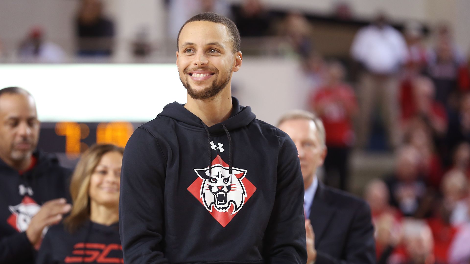 Steph Curry in a Davidson College basketball sweatshirt inside the team's arena in Davidson. 