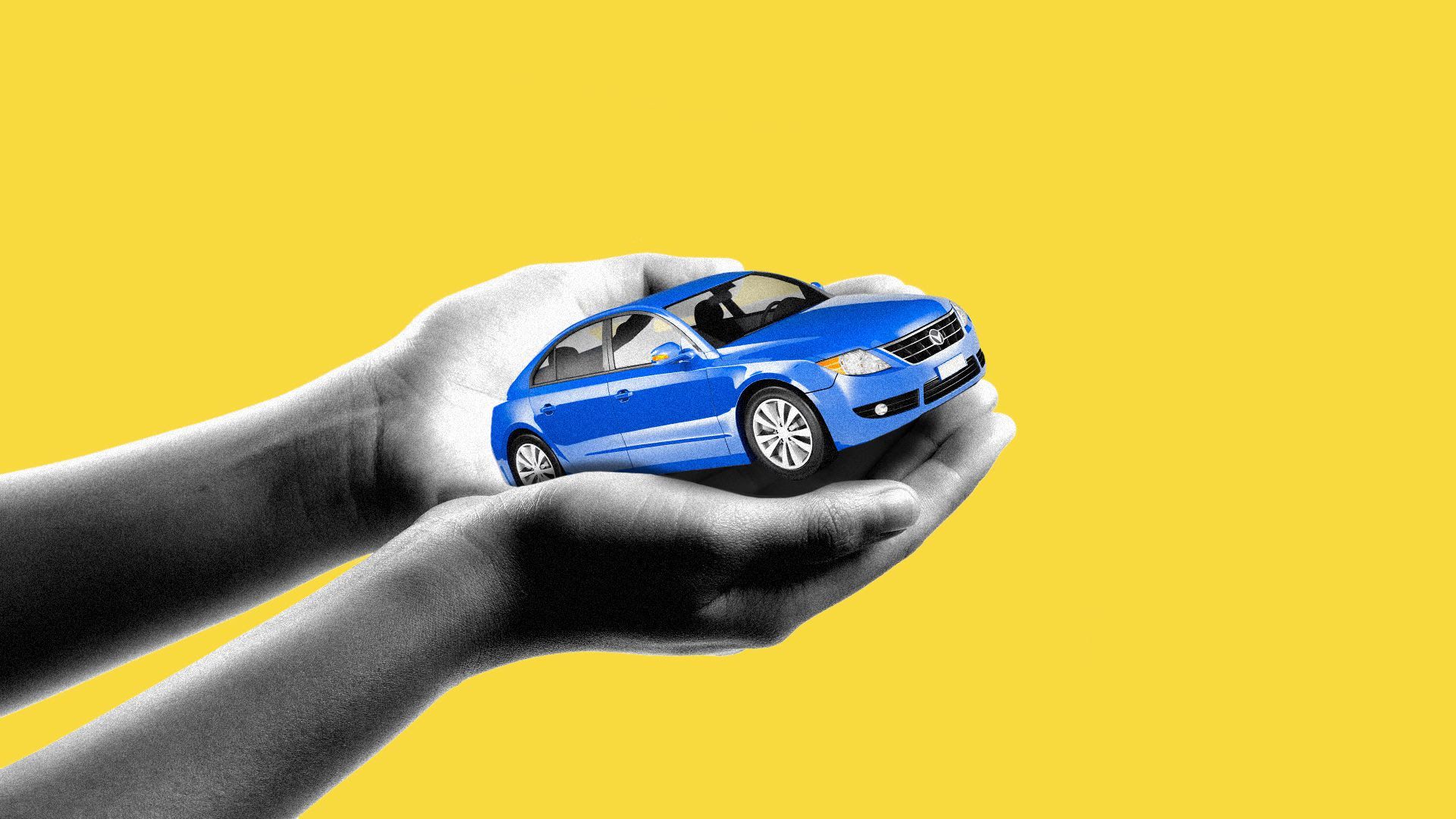 Hands holding up a self-driving car