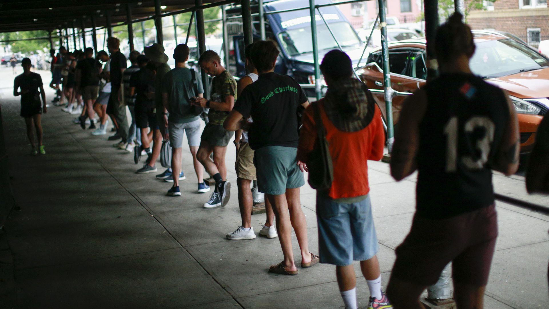 New Yorkers wait in line to receive the monkeypox vaccine in Brooklyn.