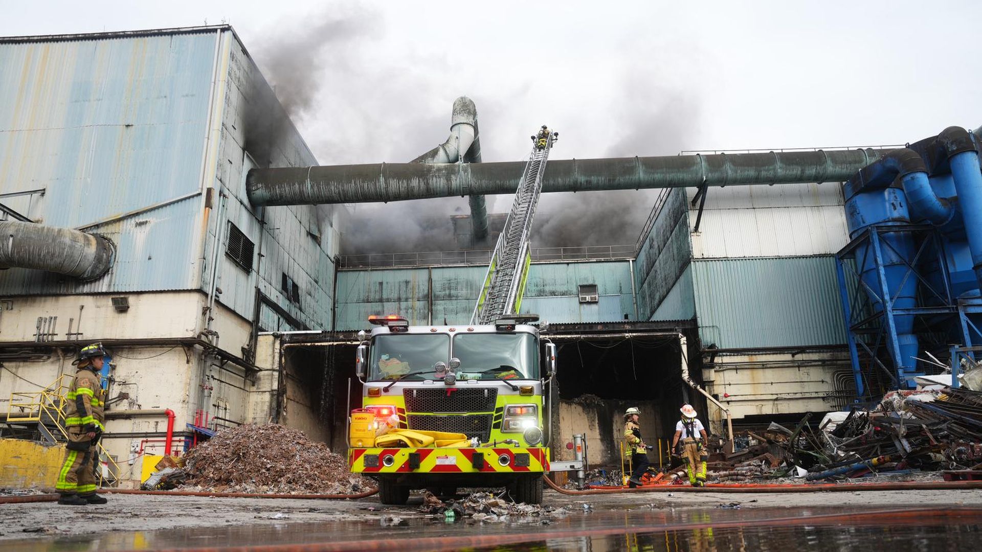 Firefighters battle a blaze at a Doral incinerator in February 2023.