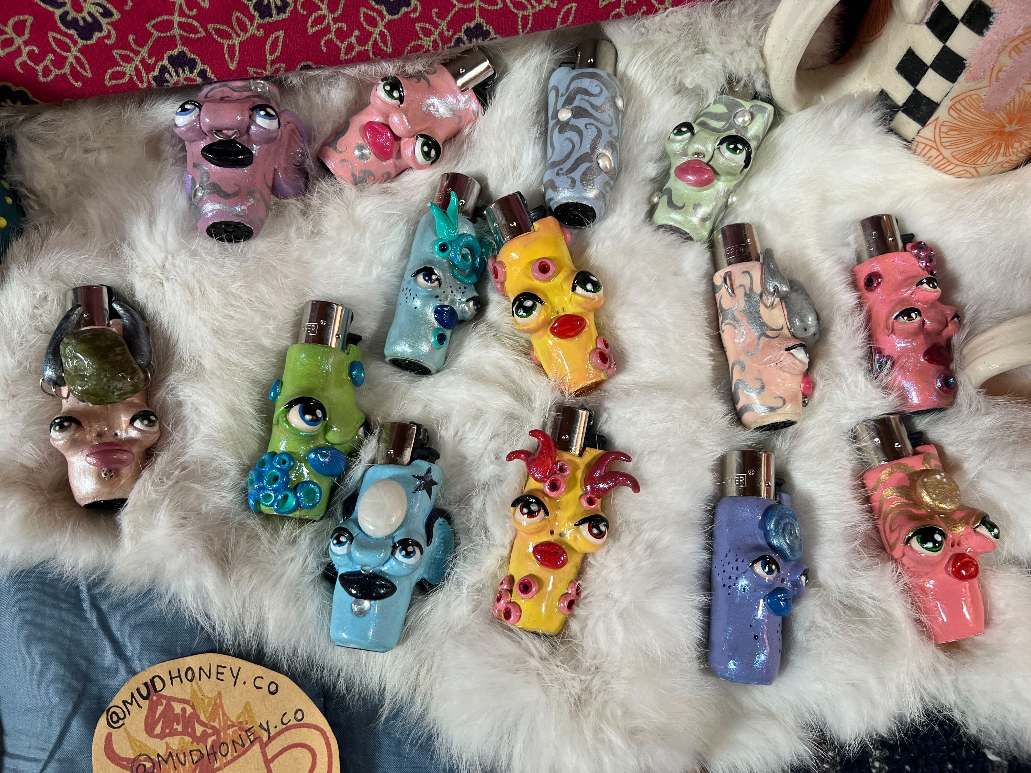 Funky face-like ceramic lighters made by Mud Honey Co.