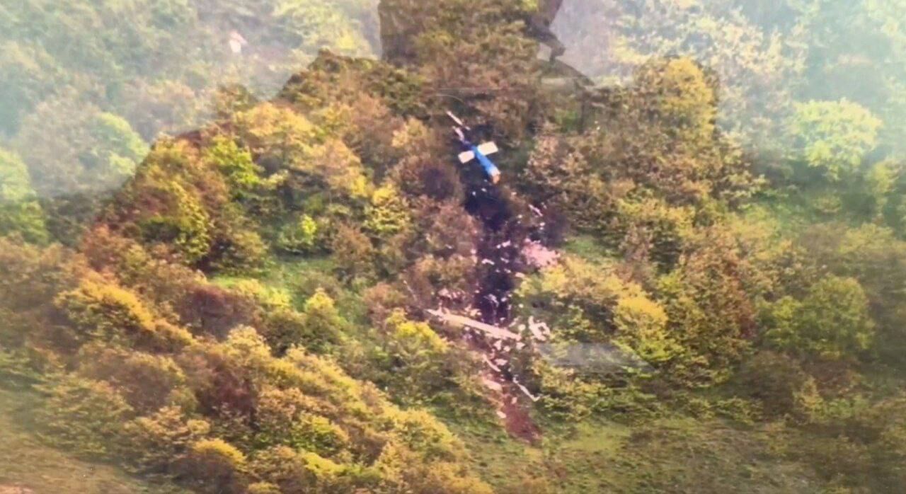 Iranian state TV image showing the scene of the helicopter crash.