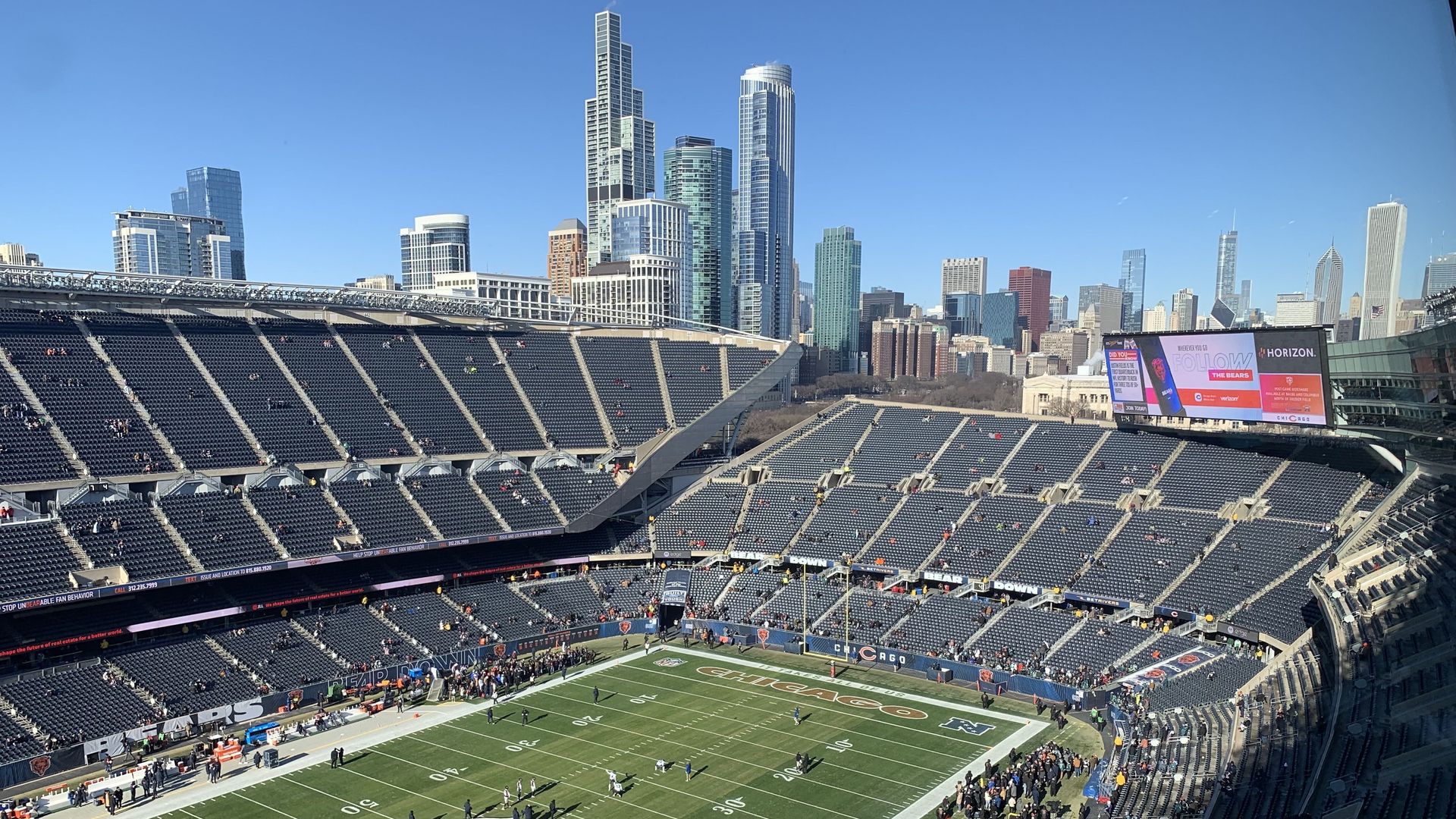 A view of the Chicago Bears stadium from a suite, with the skyline in the background.