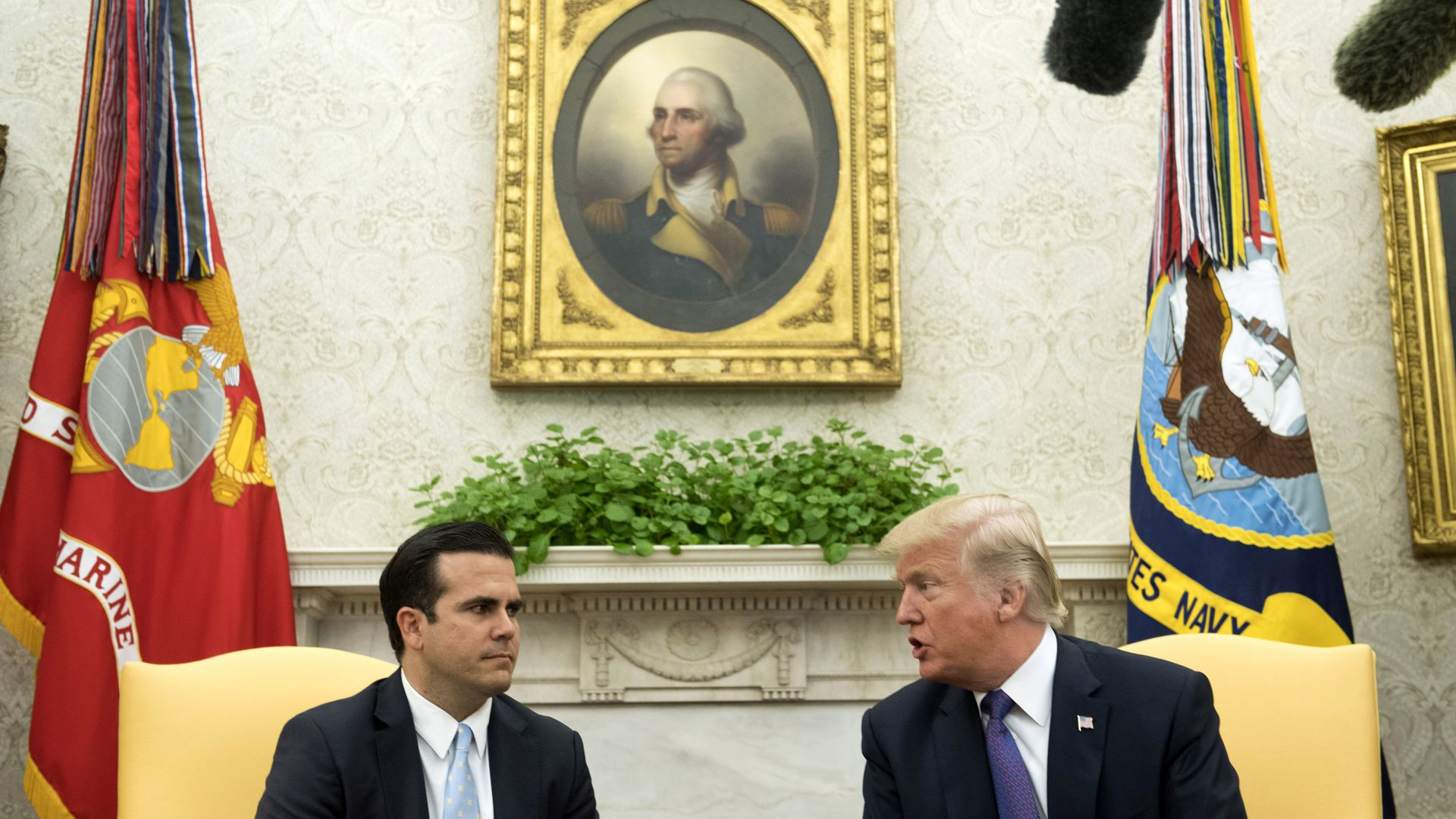 President Trump talking with the Governor of Puerto Rico in the Oval Office