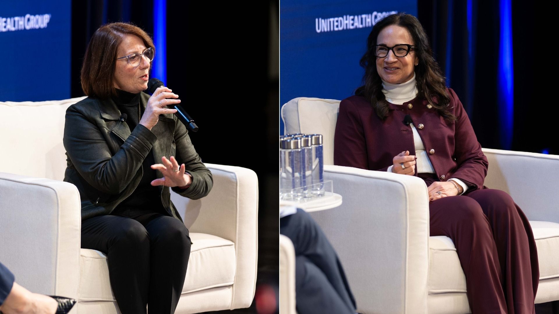 Two women seated on white armchairs on a stage, Erin Murphy in a black jacket speaking into a microphone, Lisa Demuth in a maroon suit smiling, with a blue backdrop showing "UnitedHealth Group".