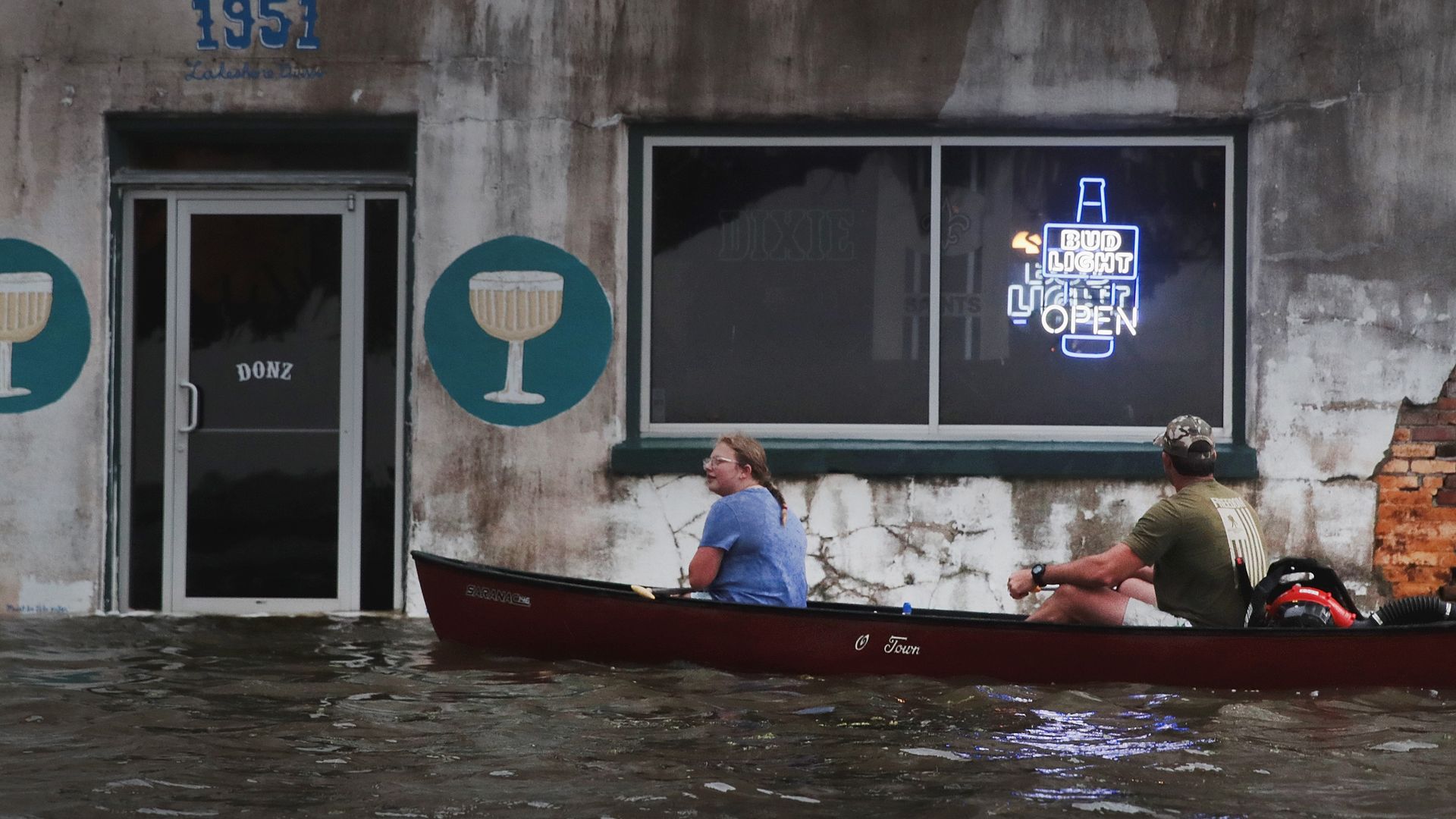  People canoe down Lakeshore Drive along the shore of Lake Pontchartrain after it was flooded in the wake of Hurricane Barry on July 13.