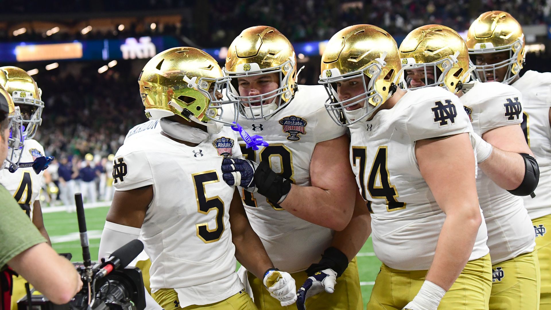Beaux Collins #5 of the Notre Dame Fighting Irish celebrates his touchdown catch with teammates just before halftime during a game between Notre Dame and University of Georgia at Caesar's Superdome on January 2, 2025 in New Orleans, Louisiana. 
