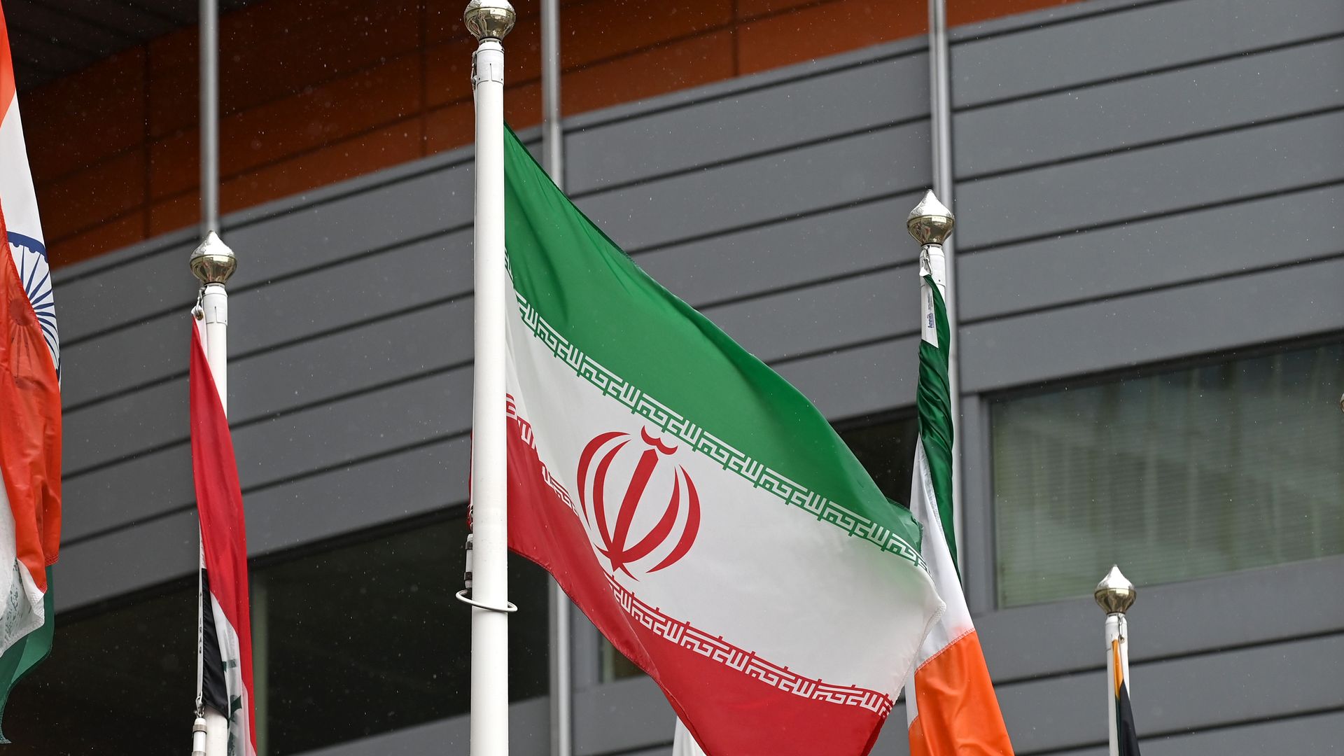 The flag of Iran is seen among others