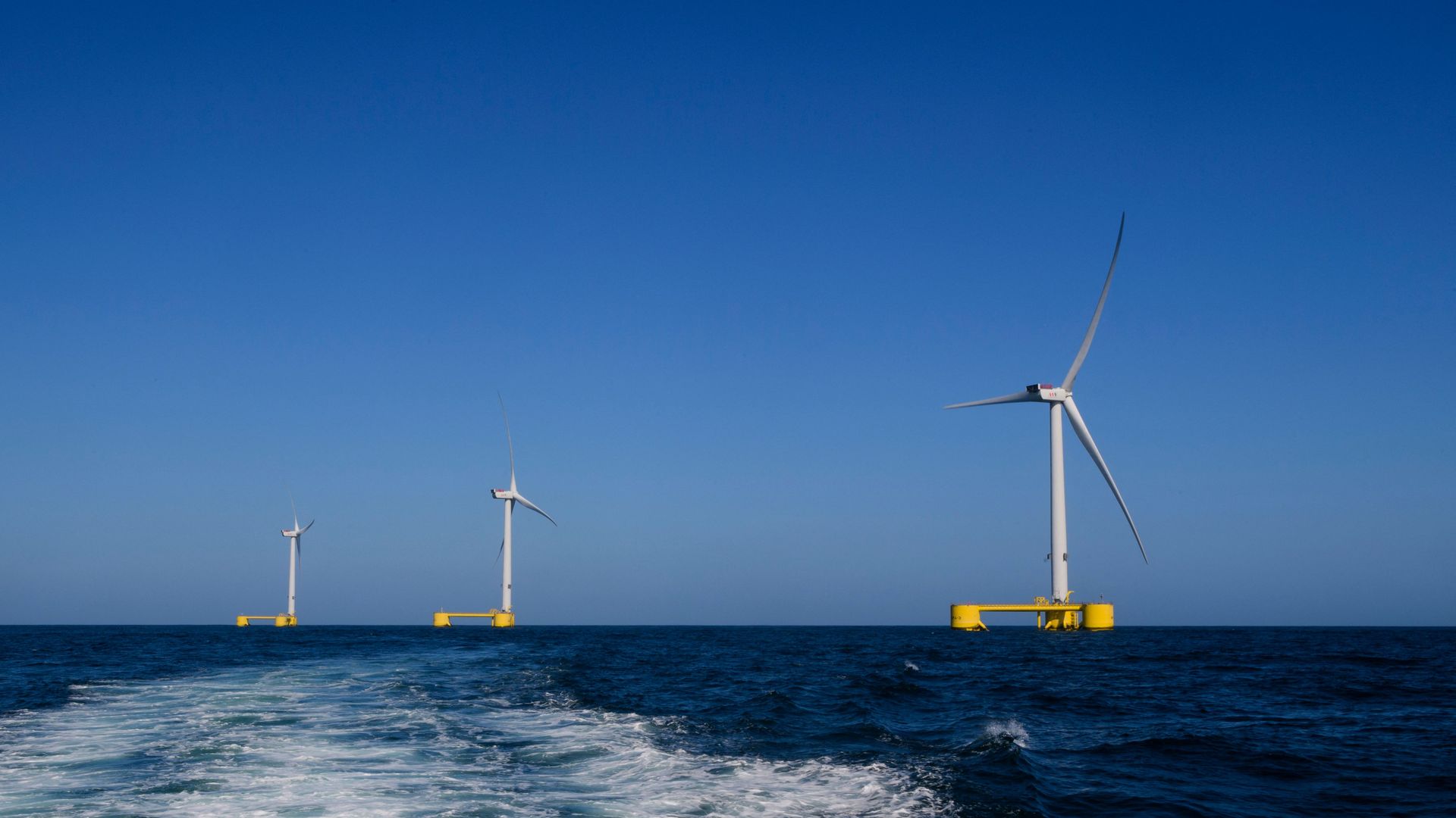 This photograph shows wind turbines at the Wind Float Atlantic floating offshore wind farm, around 20km from the coast of Viana do Castelo, northern Portugal, on July 25, 2023. (Photo by MIGUEL RIOPA / AFP) (Photo by MIGUEL RIOPA/AFP via Getty Images)