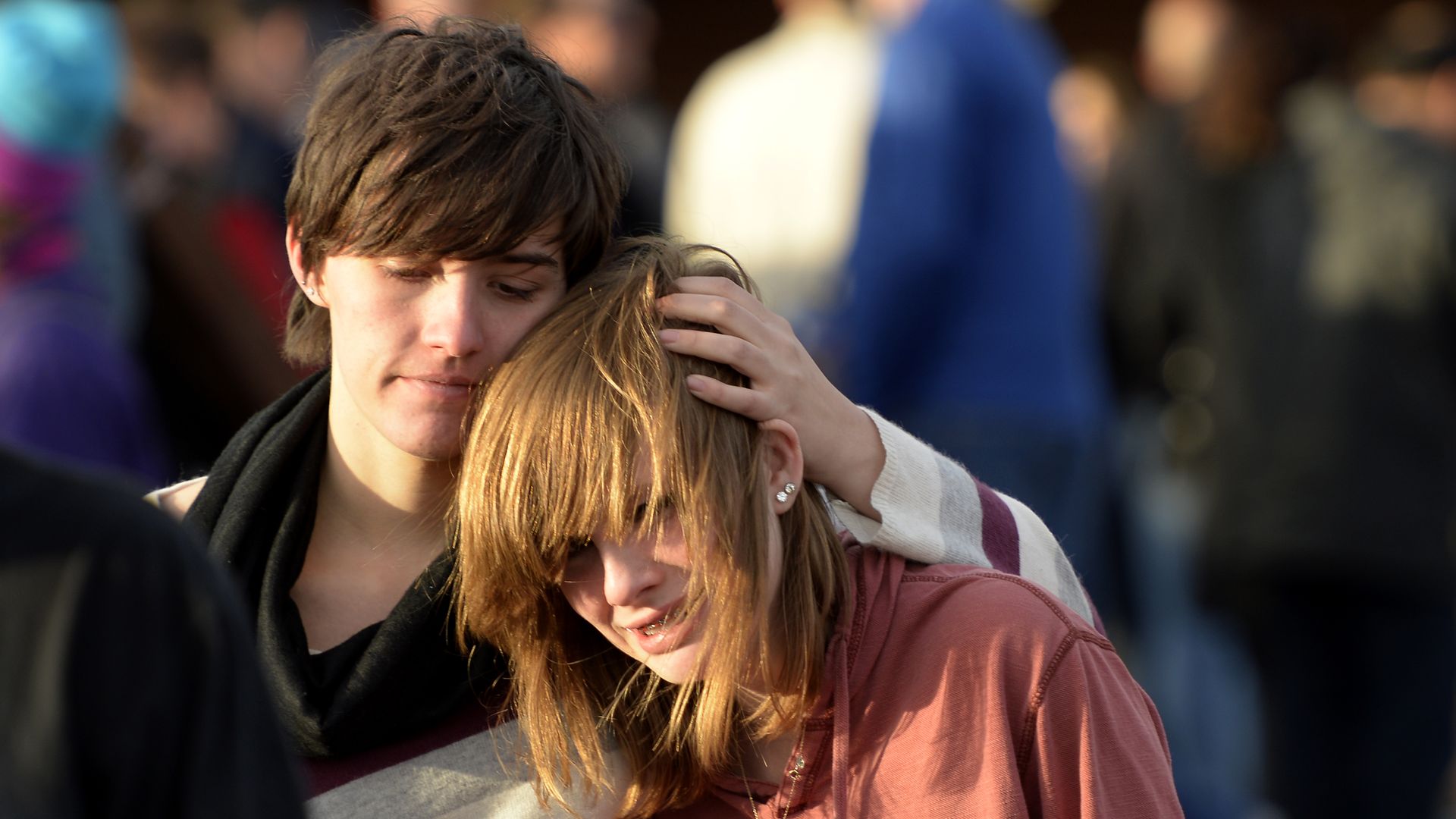 Students in tears after a school shooting