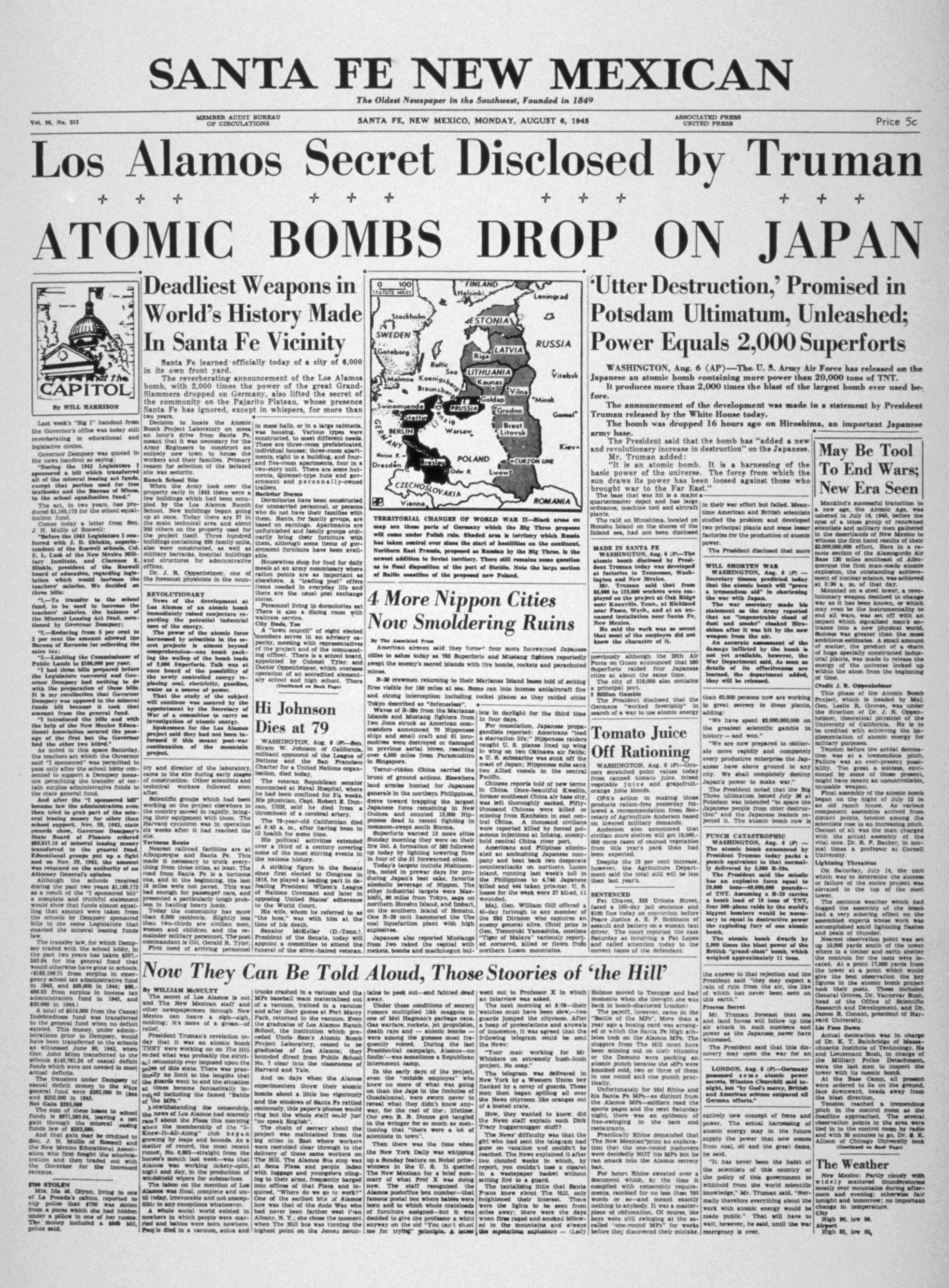 Front page of the Santa Fe New Mexican newspaper from August 6, 1945, with the headline announcing atomic bombs dropped on Japan and details about wartime developments and official statements.