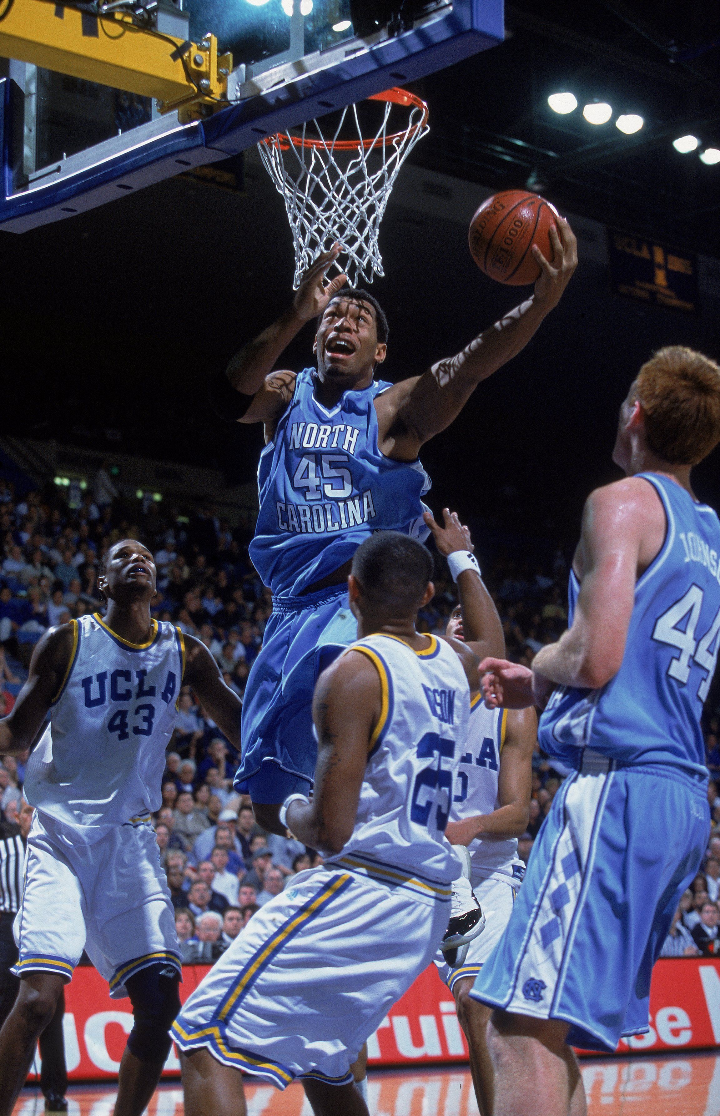 Julius Peppers playing basketball for North Carolina. 