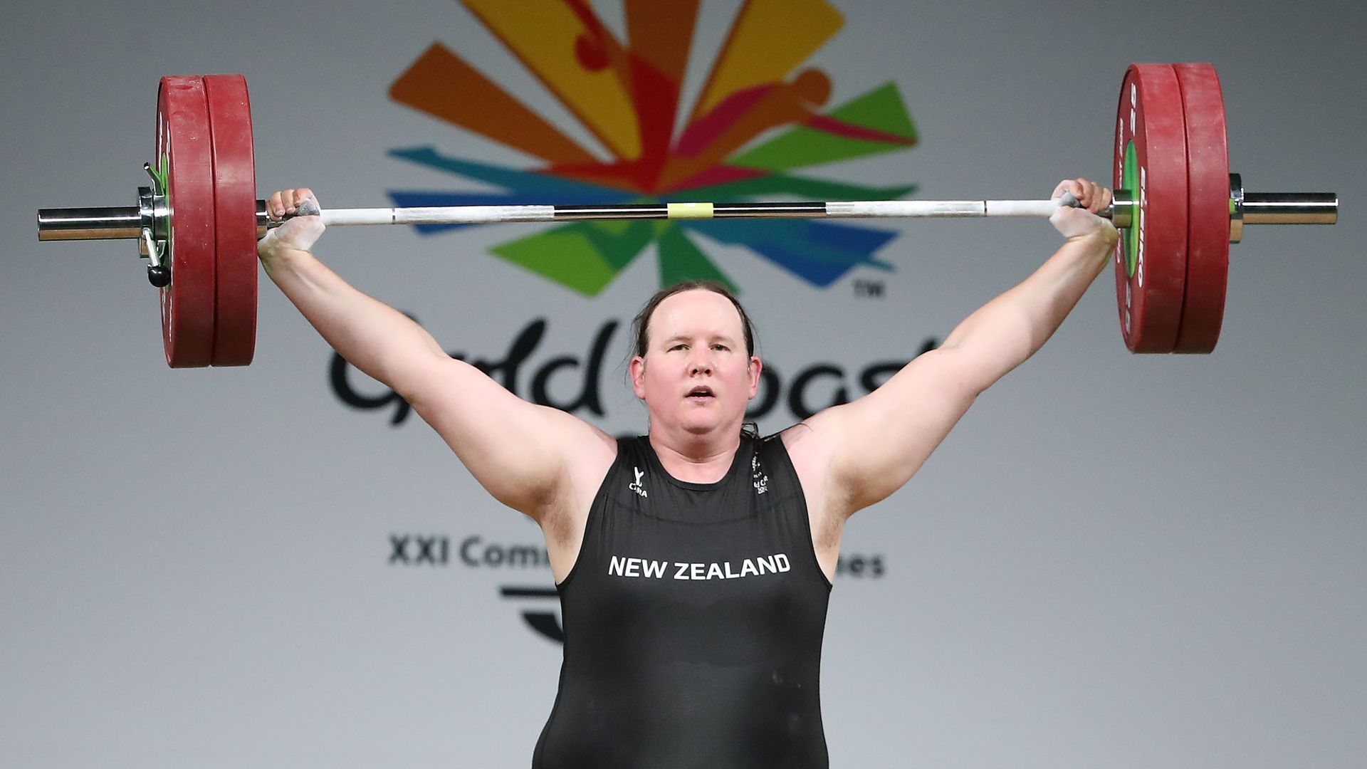 Picture of New Zealand weightlifter Laurel Hubbard, a transgender woman, lifting weights.