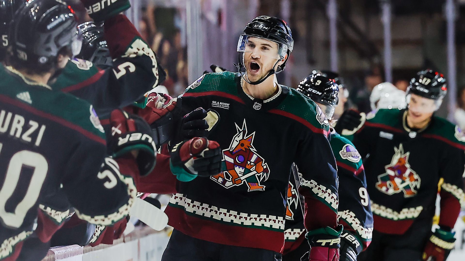Hockey players celebrating.