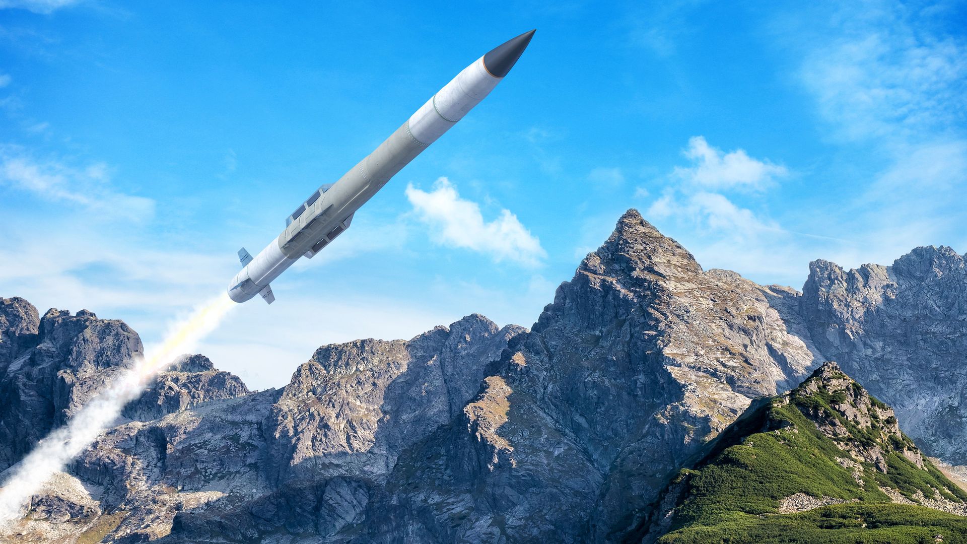 An artist's render of a missile interceptor zipping through the air. Below are mountain ranges.