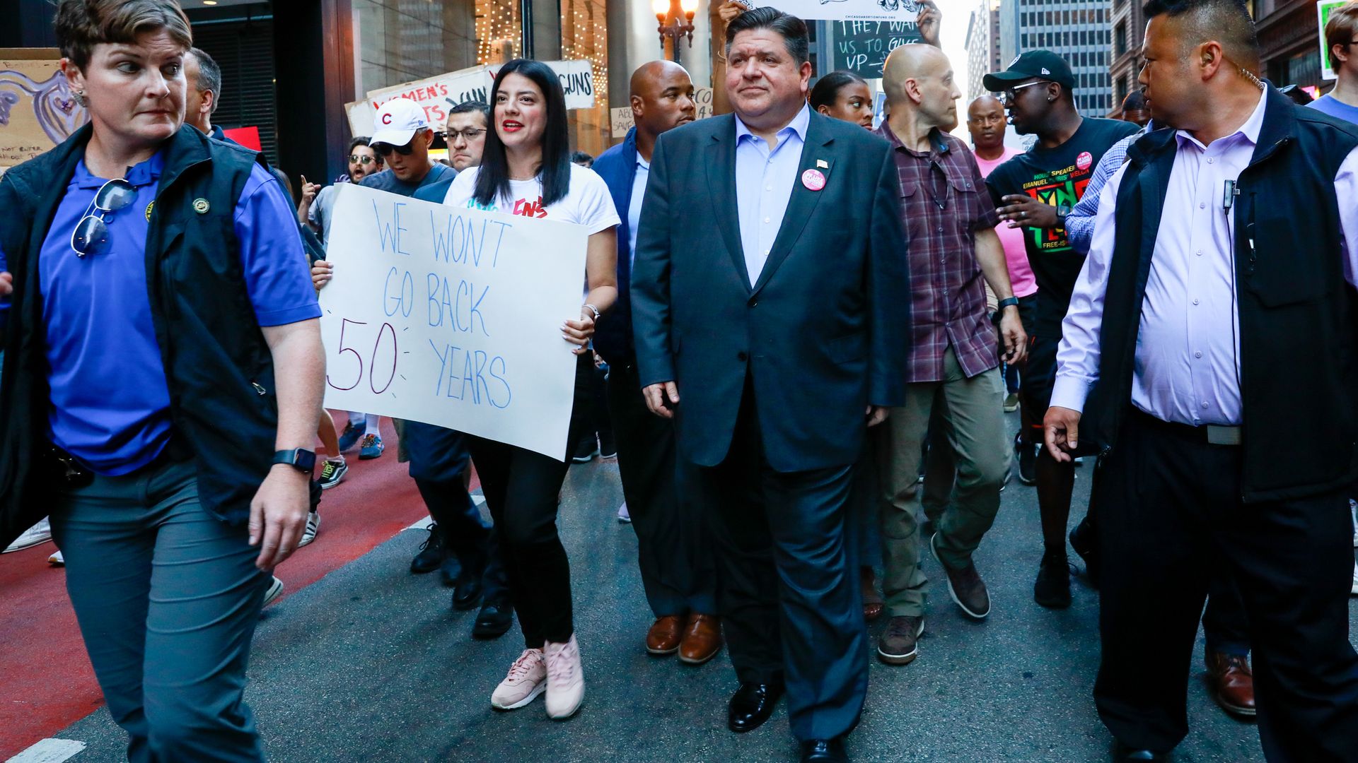 Governor marching at a protest 