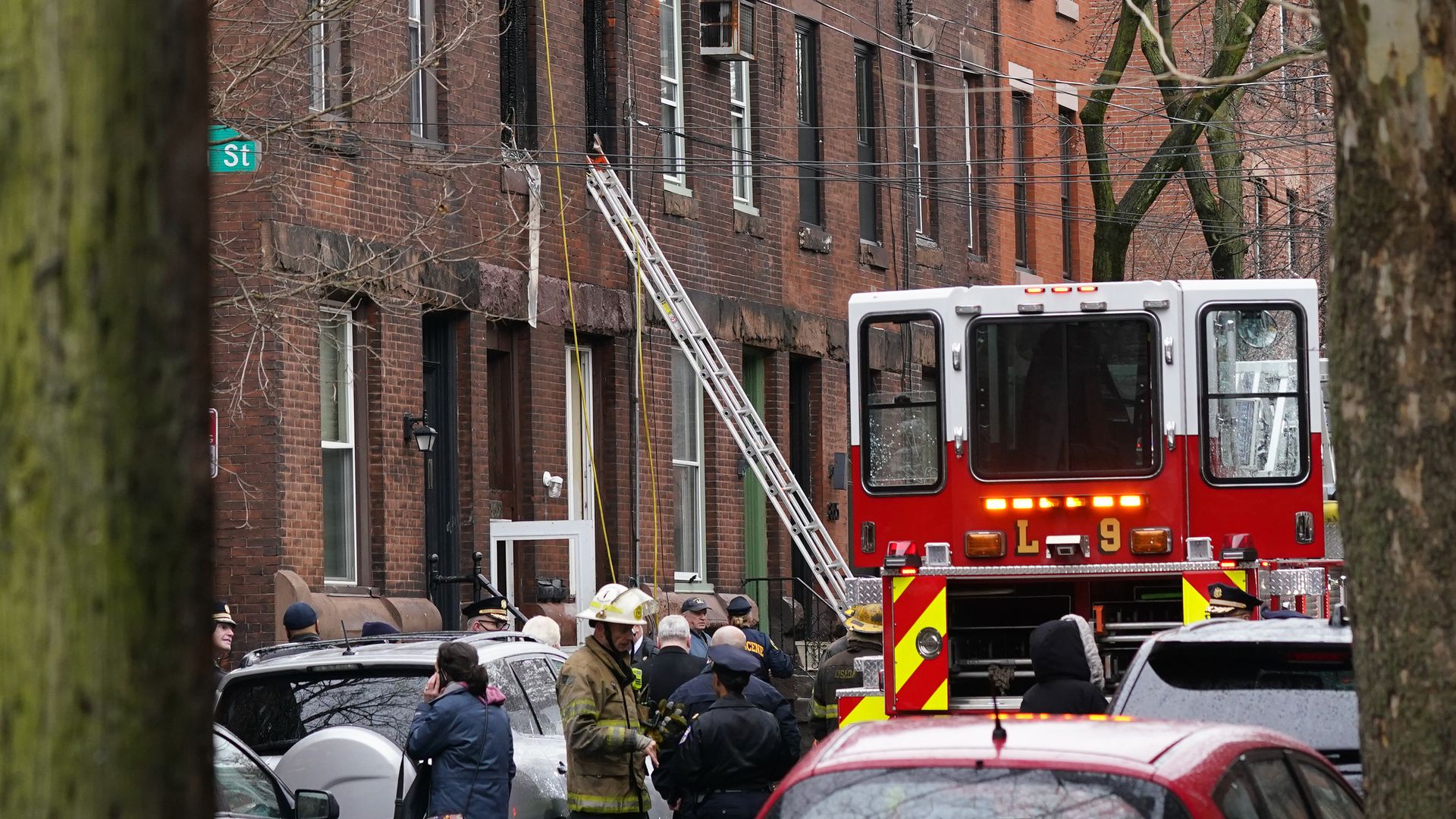 Philadelphia firefighters work at the scene of a deadly row house fire on Jan. 5 in the Fairmount neighborhood.