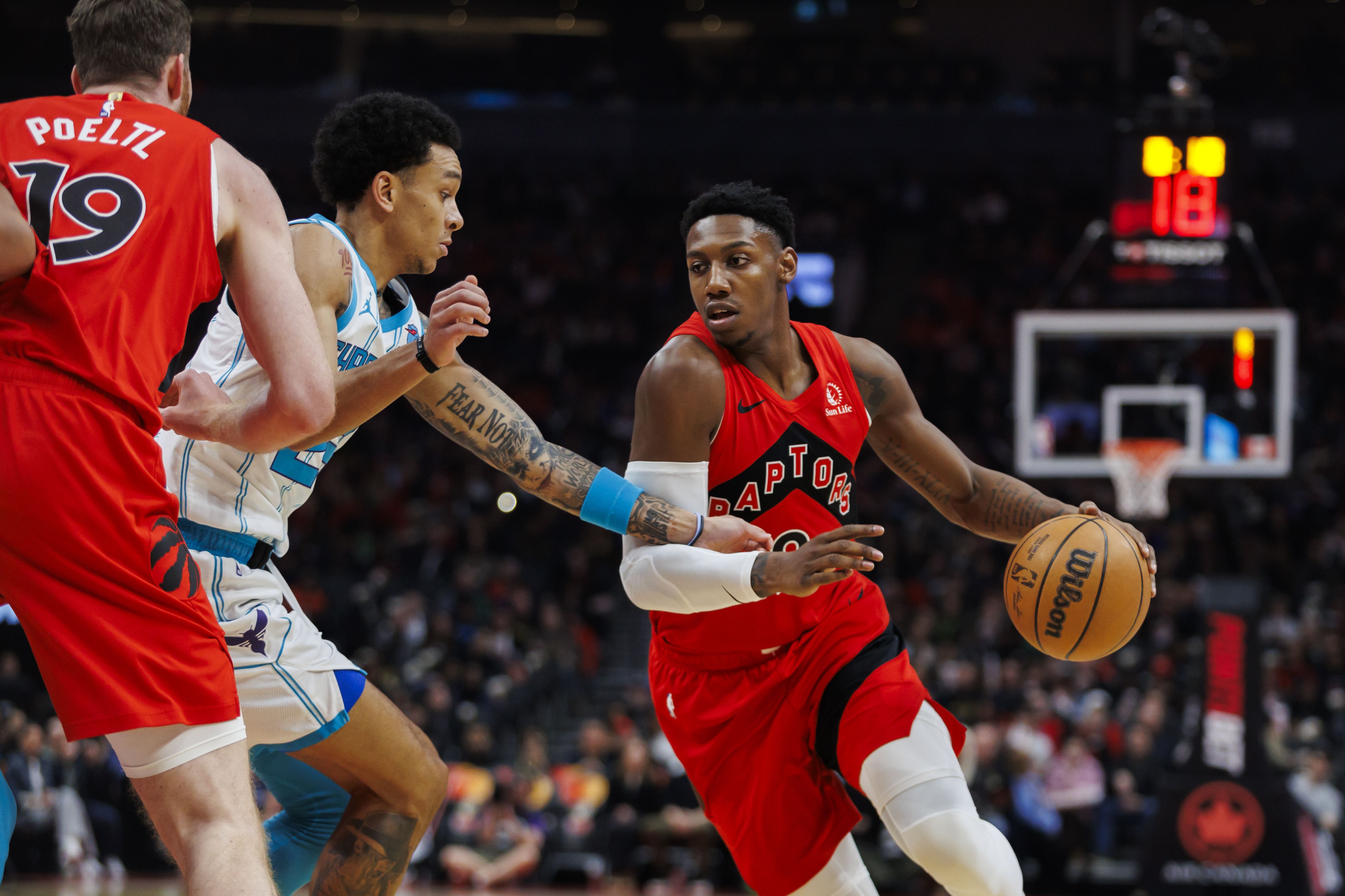 RJ Barrett playing for the Toronto Raptors vs. the Charlotte Hornets. 