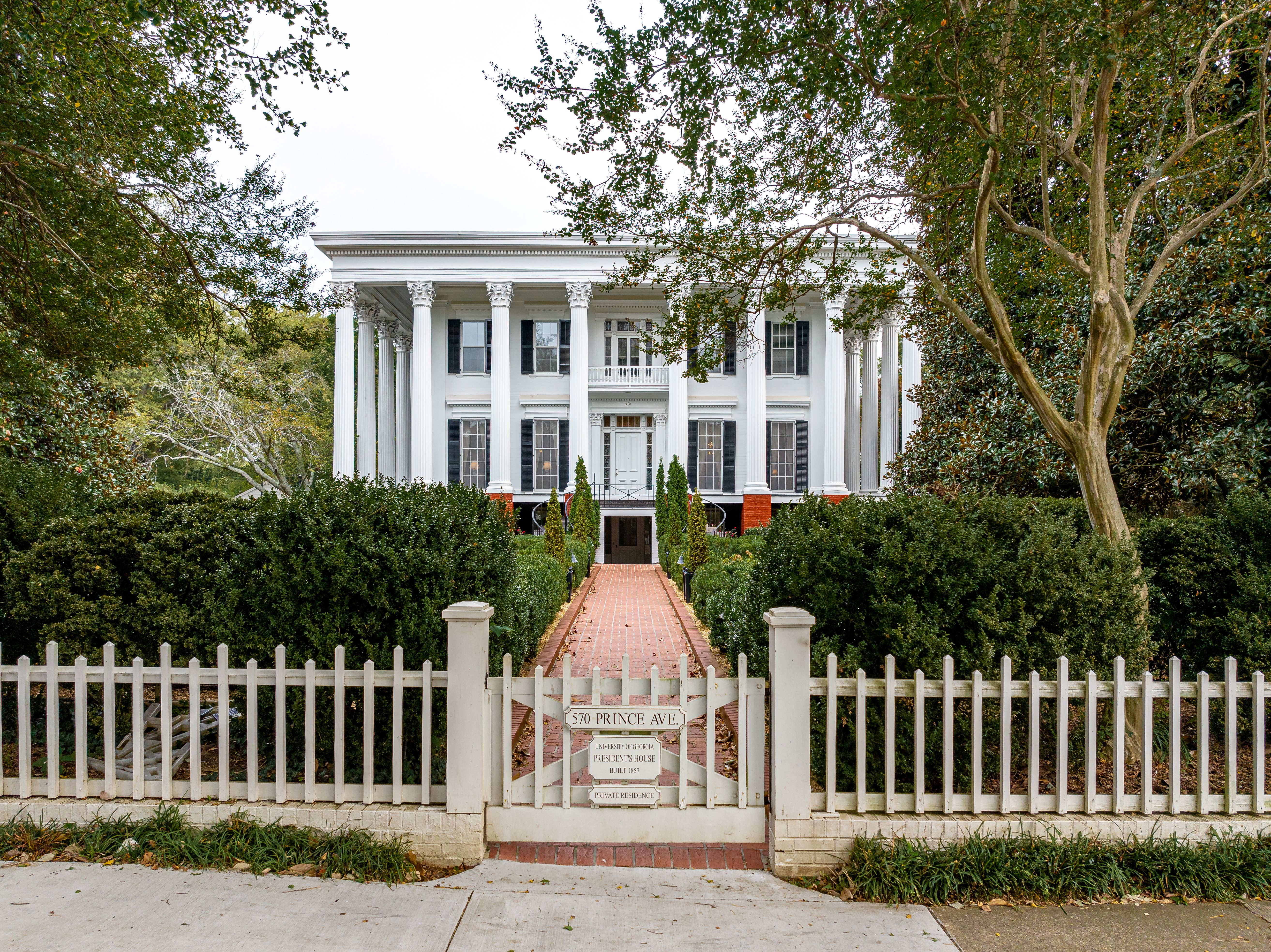 View of the home from the white picket fence. 