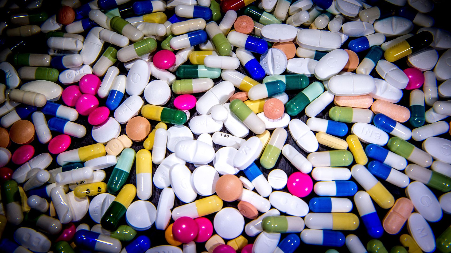A pile of drug capsules and pills.